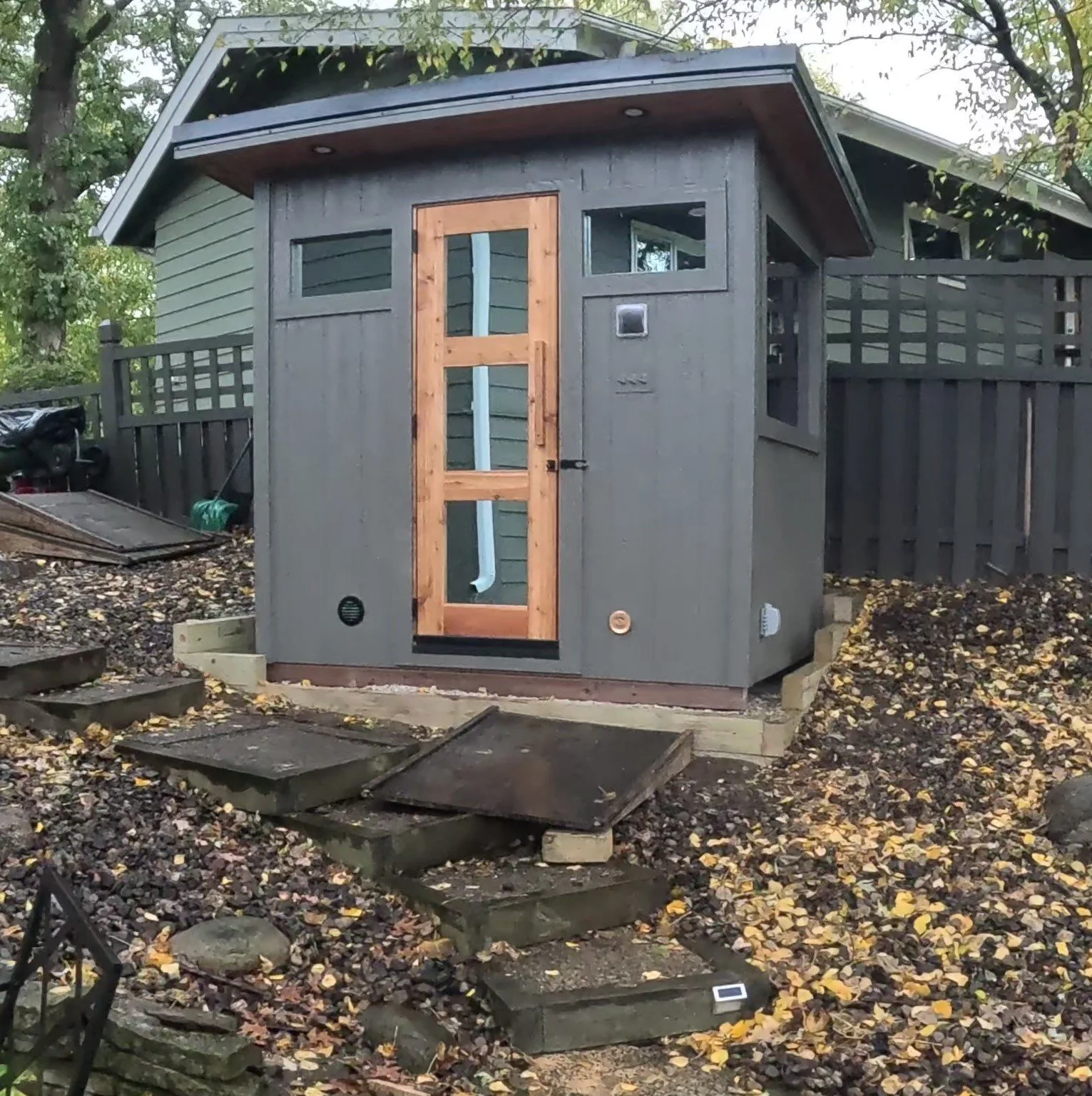 Outdoor custom sauna with weather-resistant wood exterior built locally