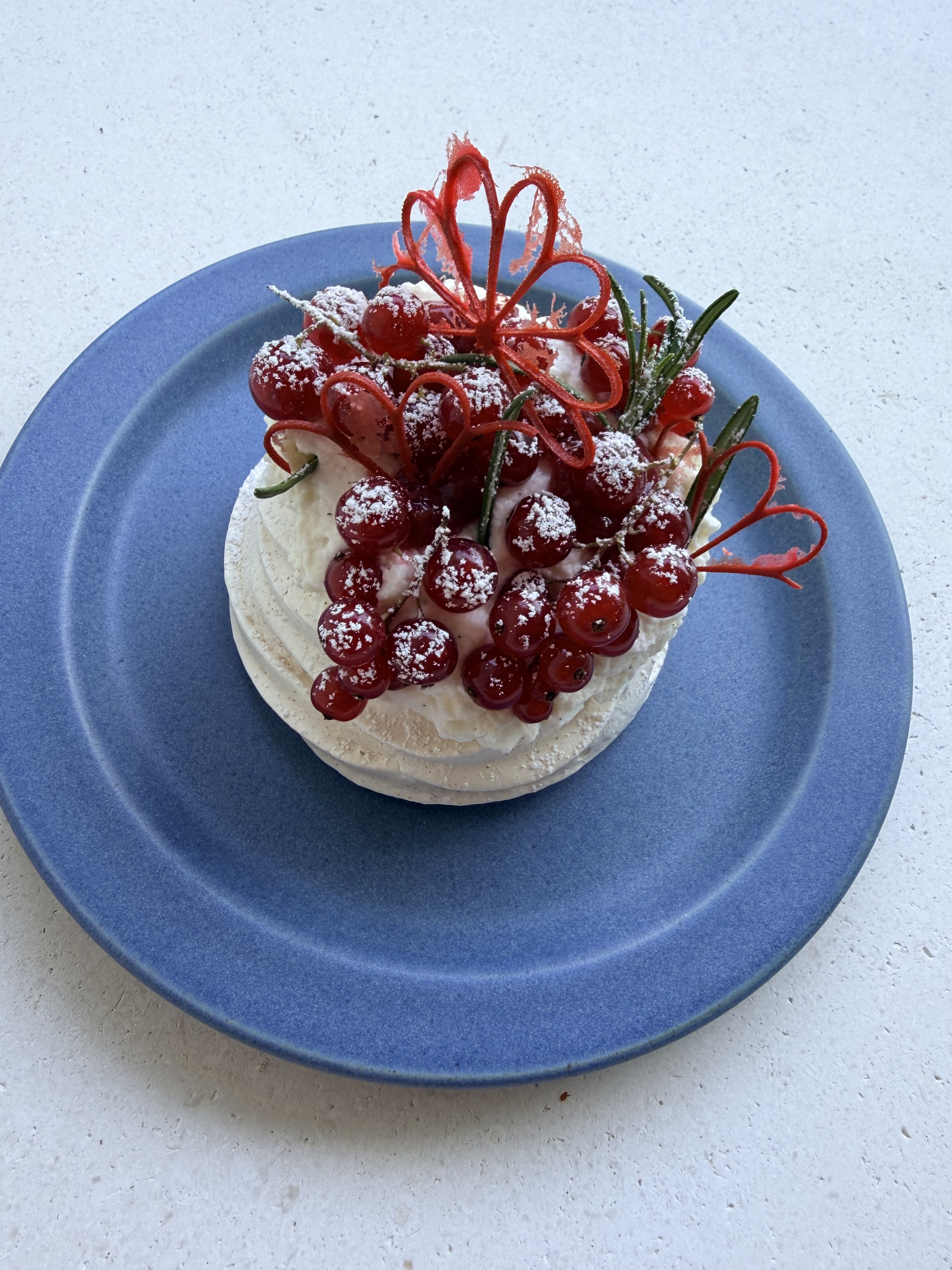 Red Currant Pavlova with raspberry sauce