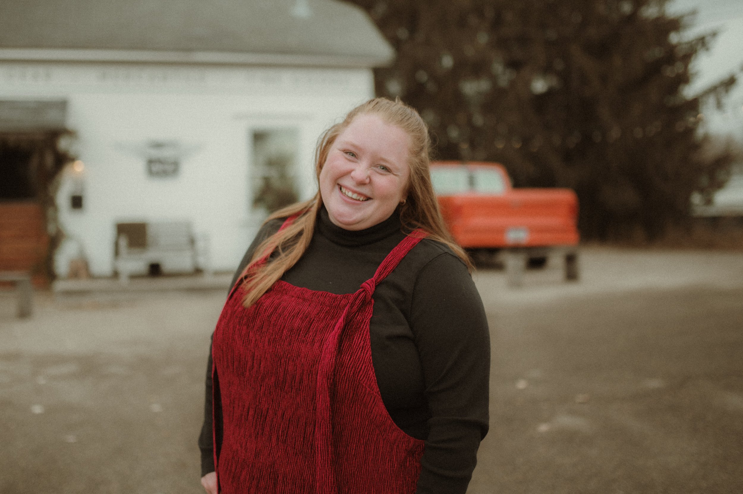 Girl smiling at camera during a winter family photo session