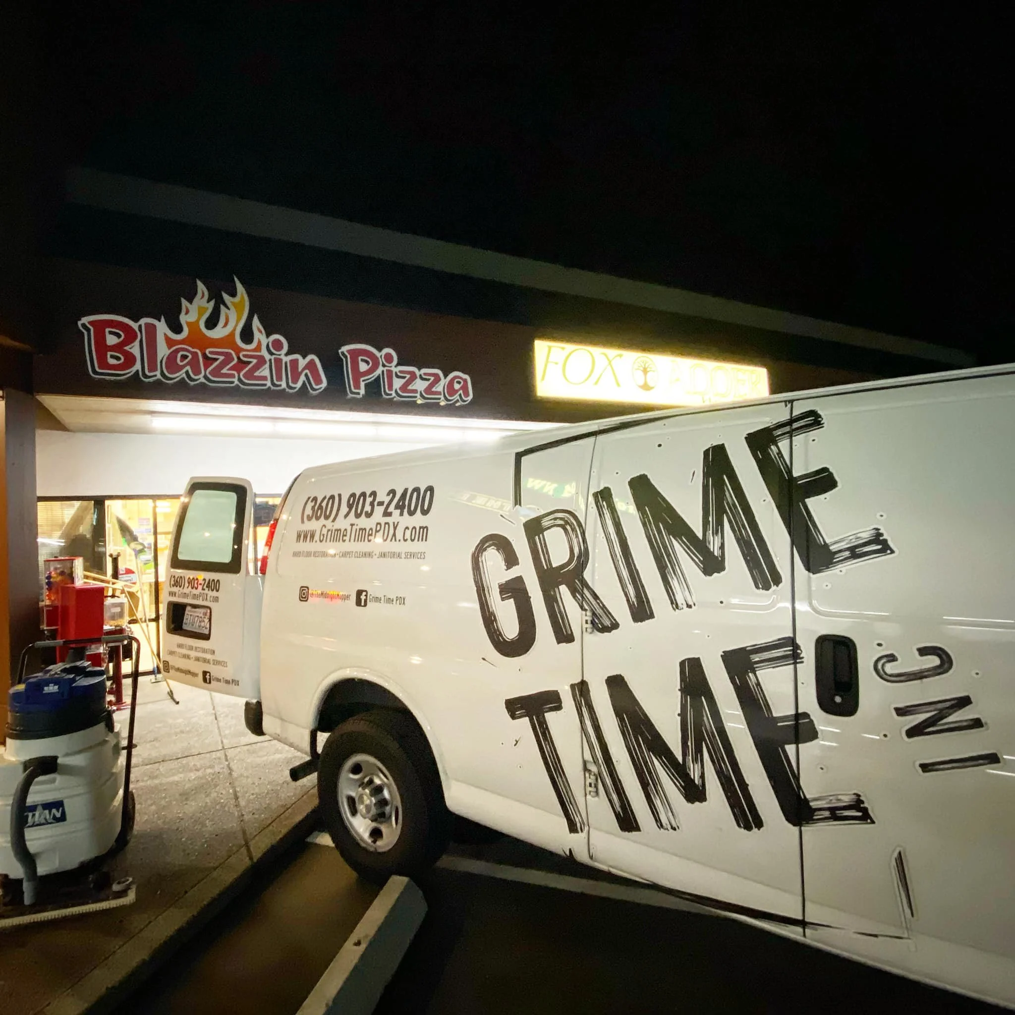 Grime Time, Inc. van in action on a job site, showcasing professional branding and commitment to delivering top-notch cleaning services.