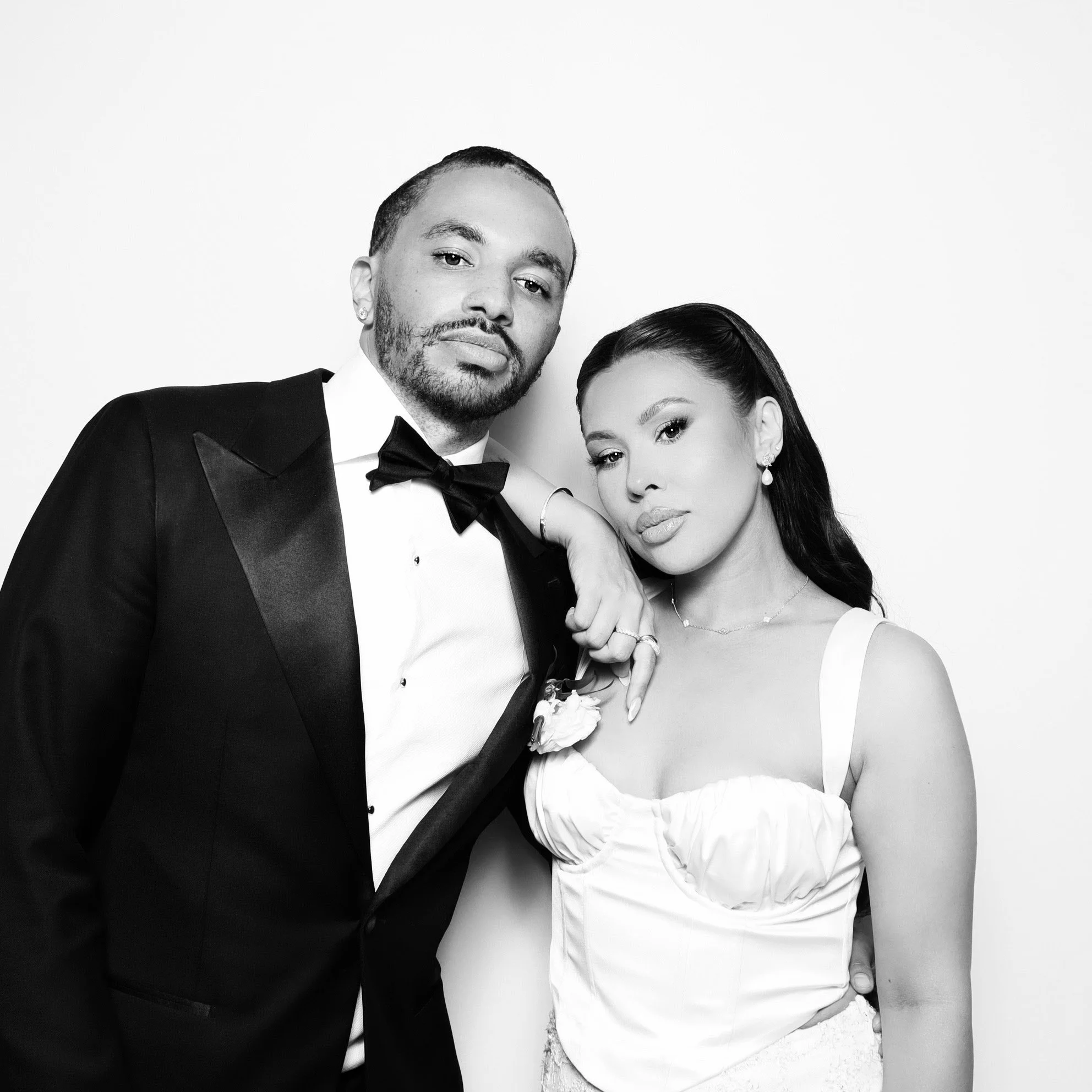 Glam style black and white photo booth of a couple at an Orange County wedding