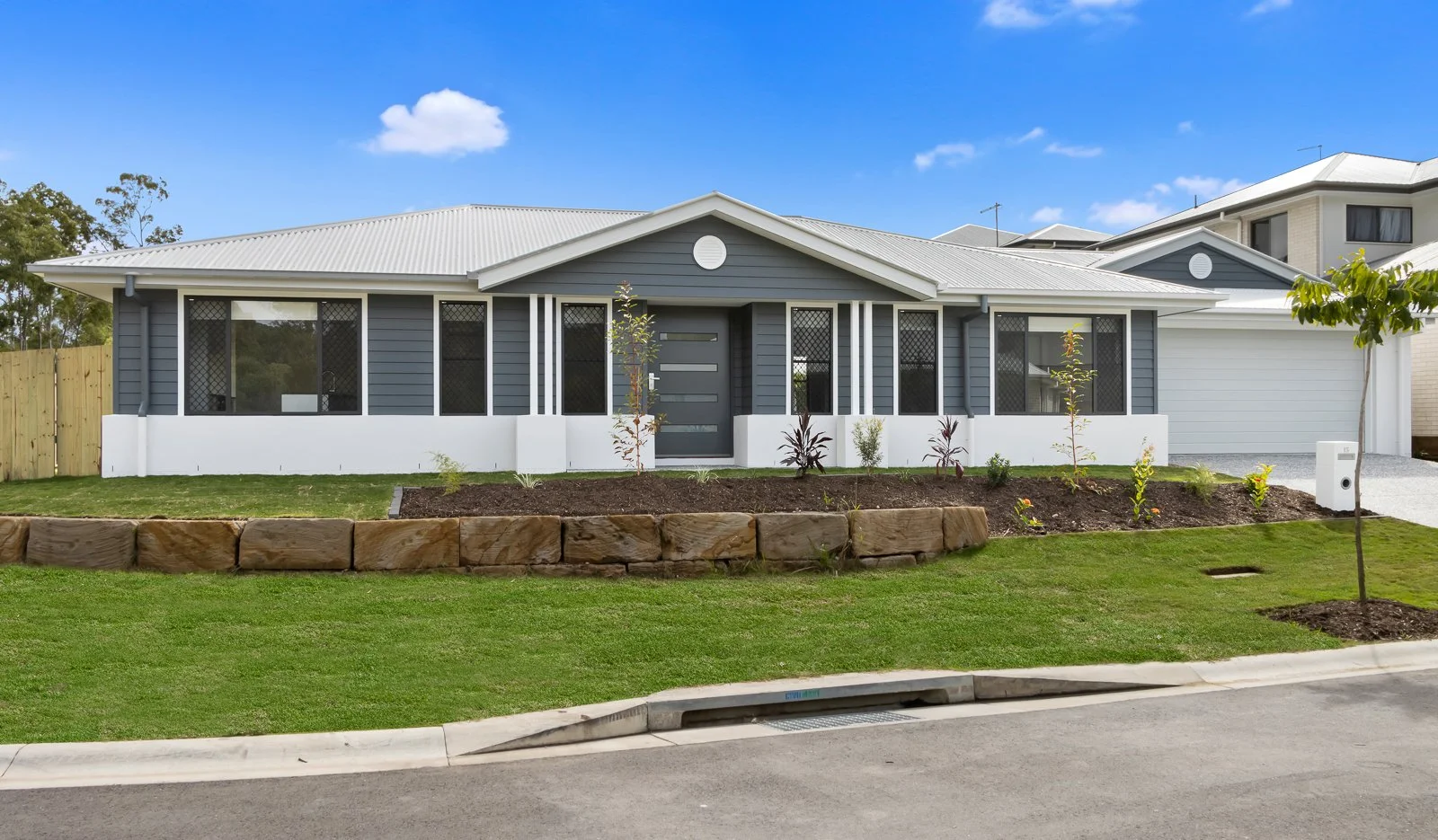 FRONT_LR_with grass.jpg