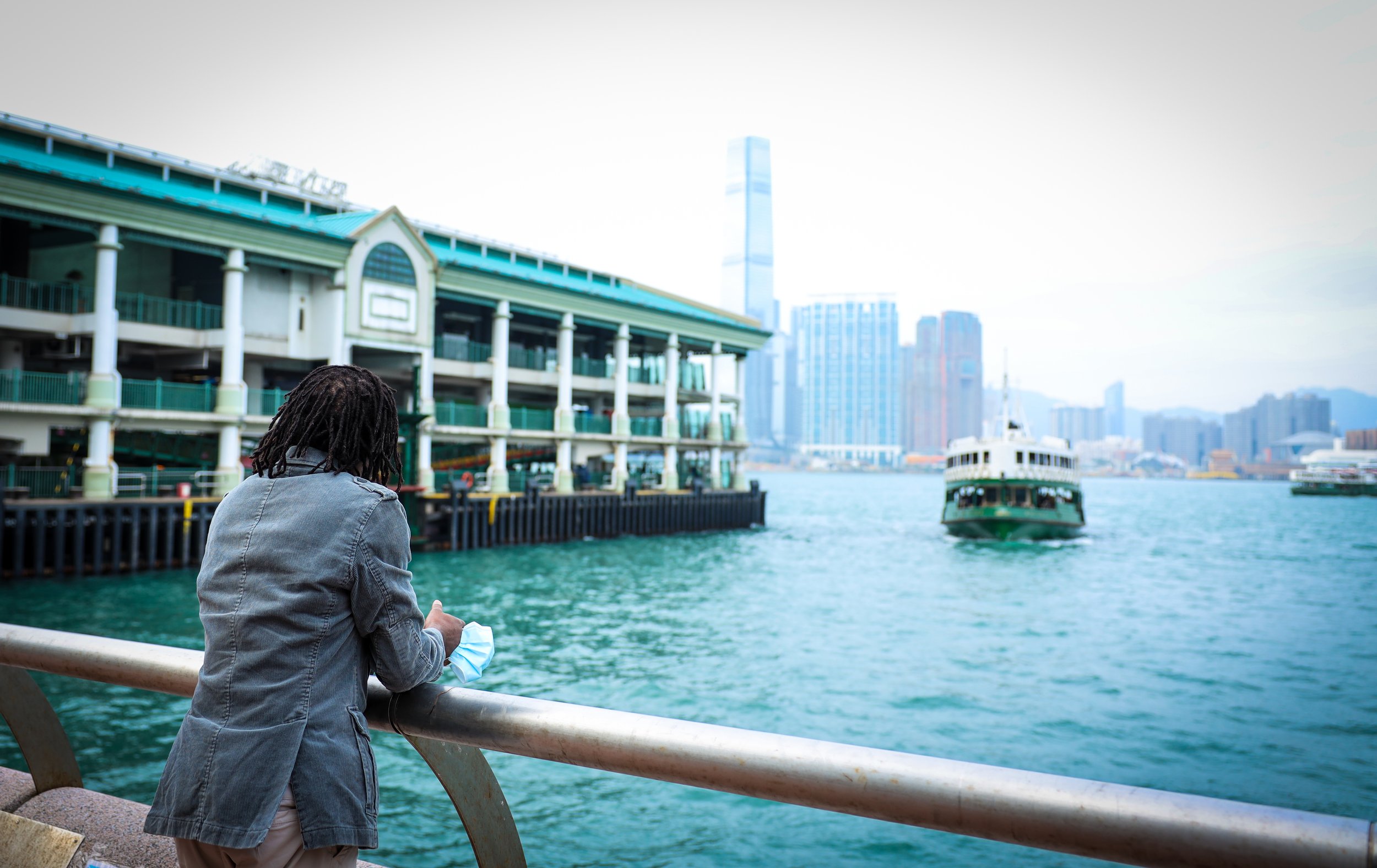 A Refugee looking out towards Star Ferry Central, HK