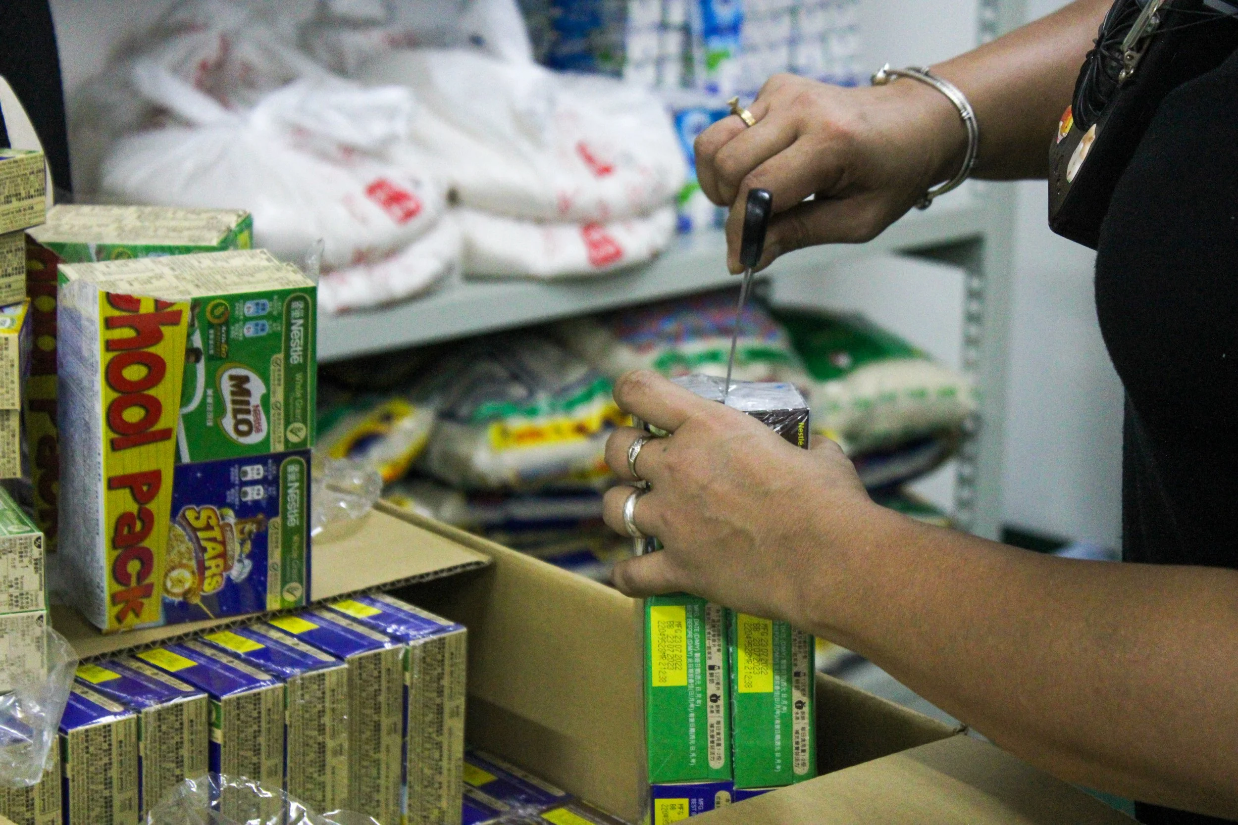 Volunteer unpacking supplies