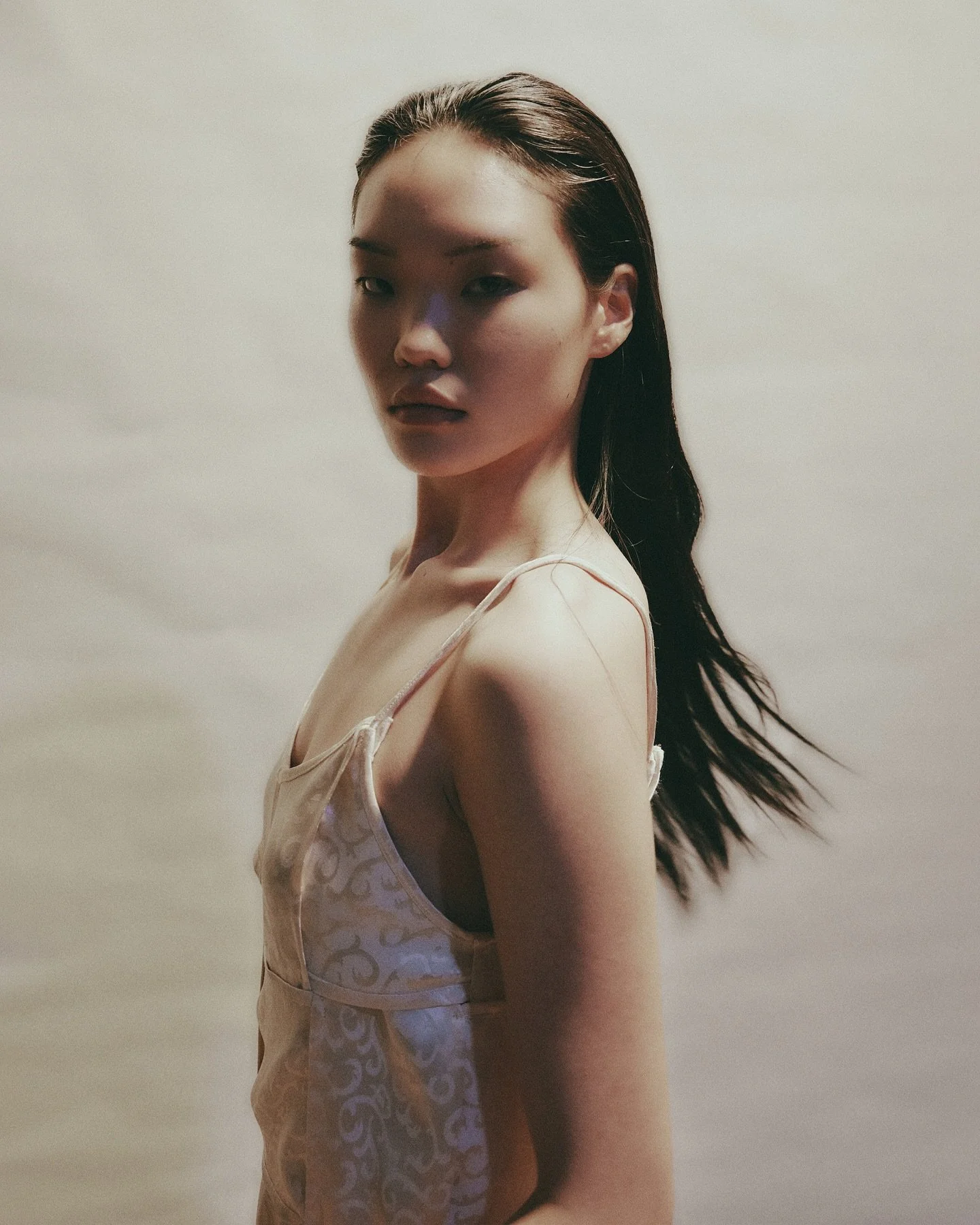 the Casablanca mini dress in silk 

The silk jacquard alternates between sheen and matte, entwined around the body in a woven pattern.