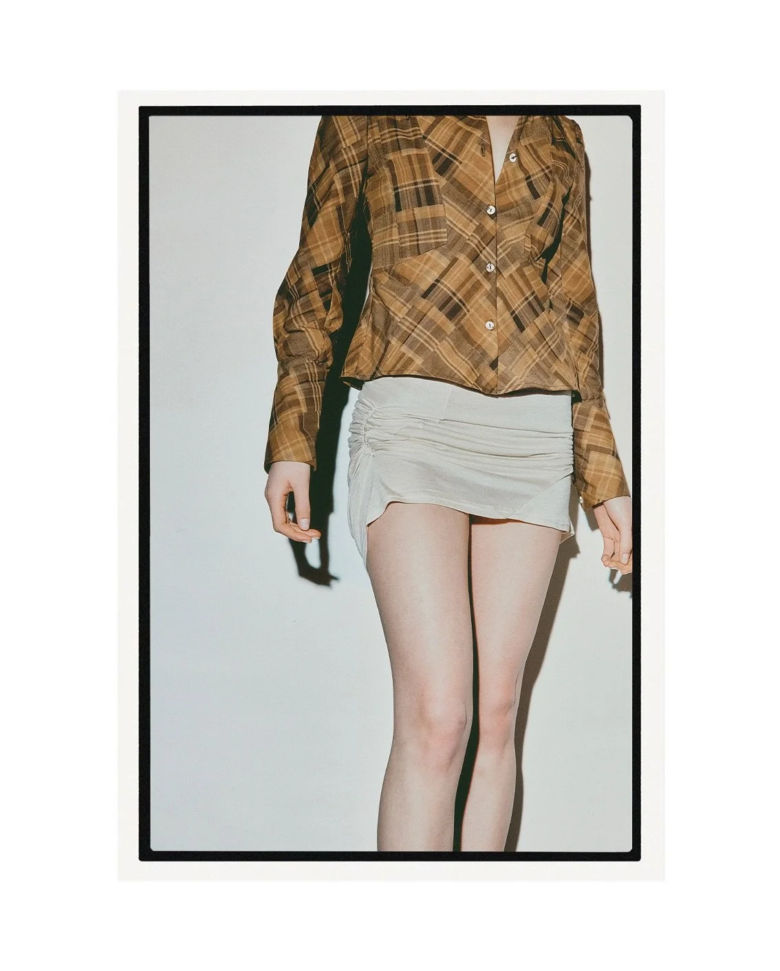 SPRING-SUMMER 2025
Tailored shirt paired with the Wabi mini skirt

Photography @joshszeto_ 
Talent @sophiesong