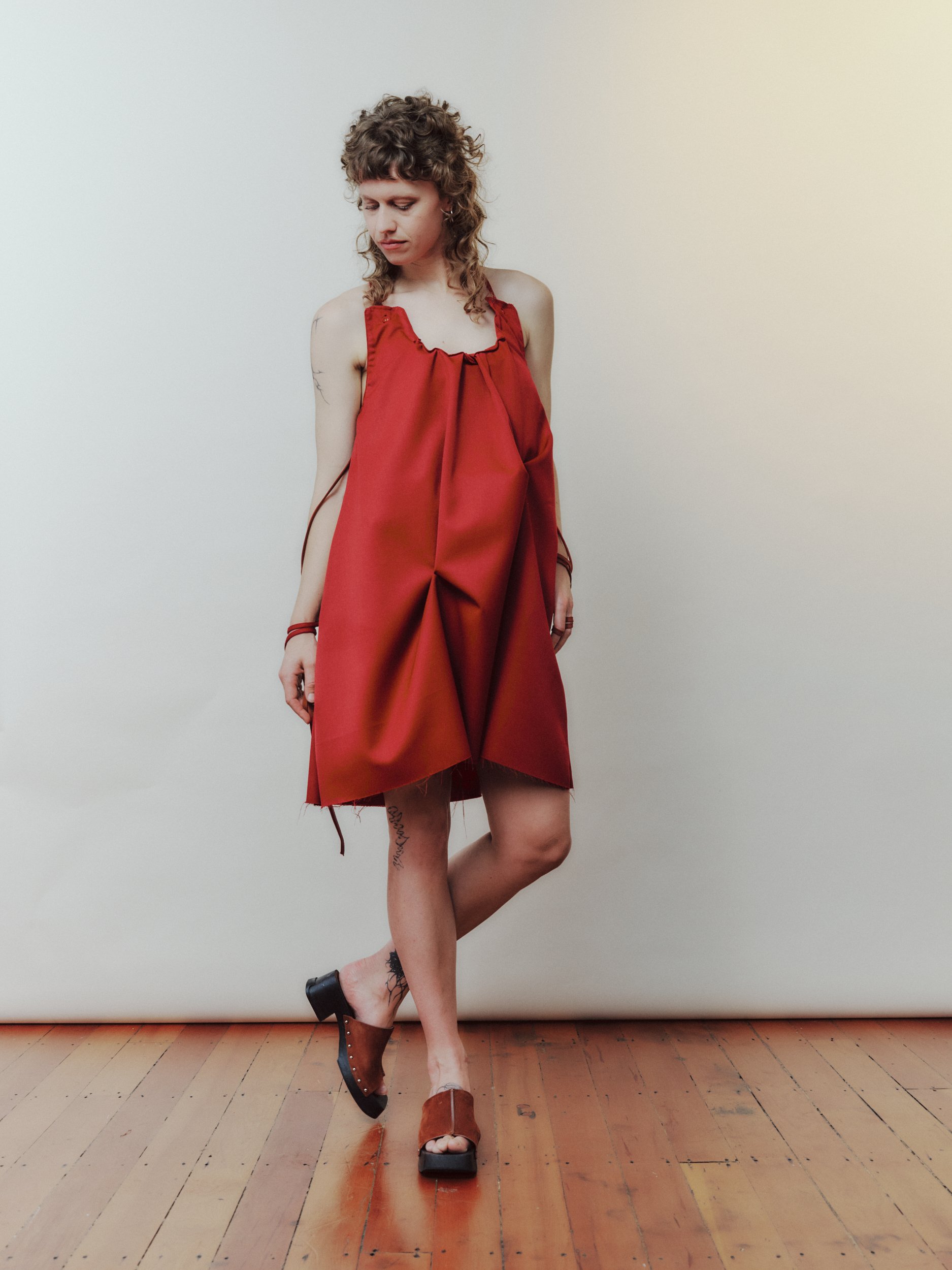 Daf Nimkovsky Woman in Red Lee Dress in Wool Front