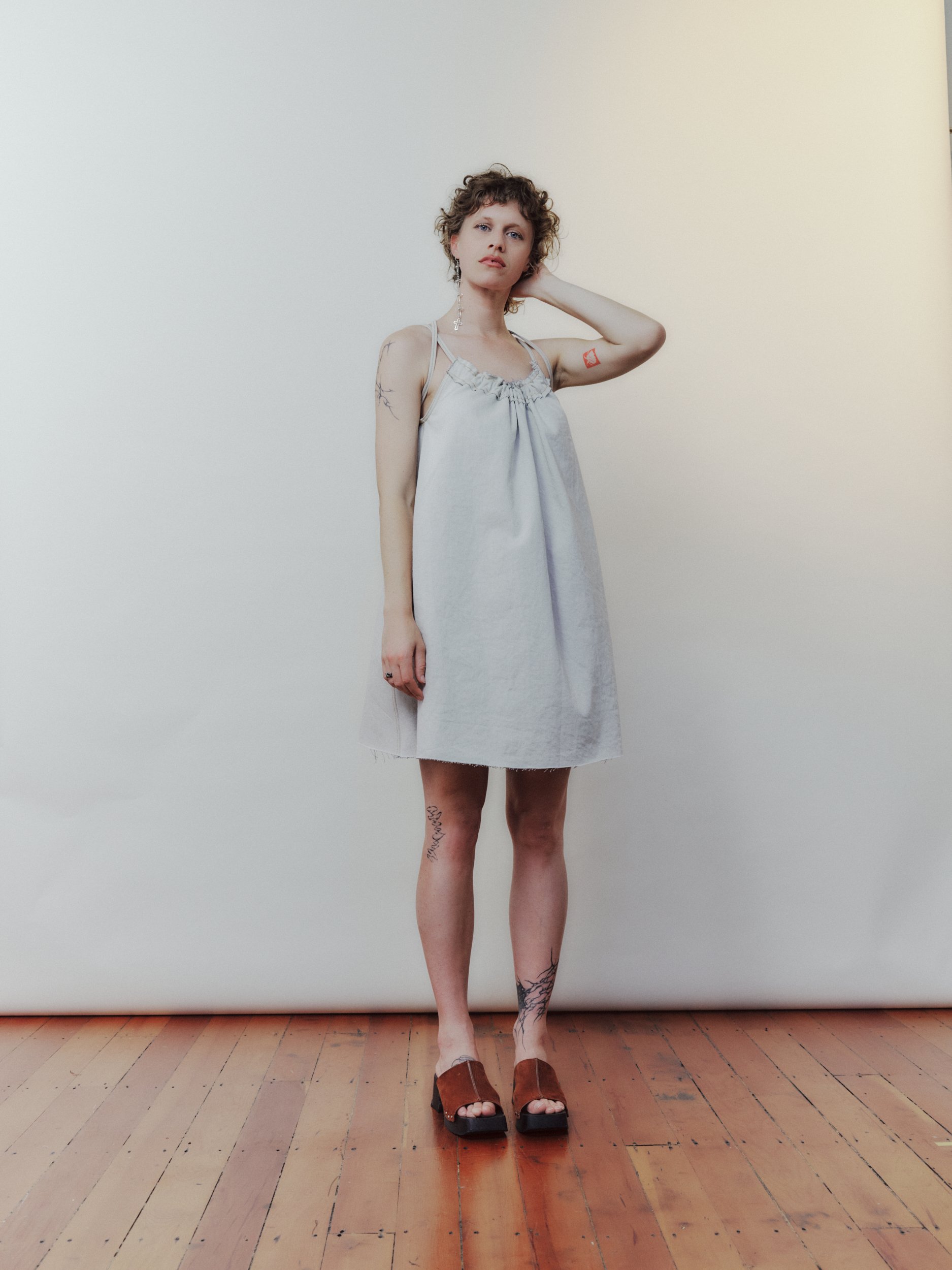Daf Nimkovsky Woman in White Nippers Mini Dress in Denim Front