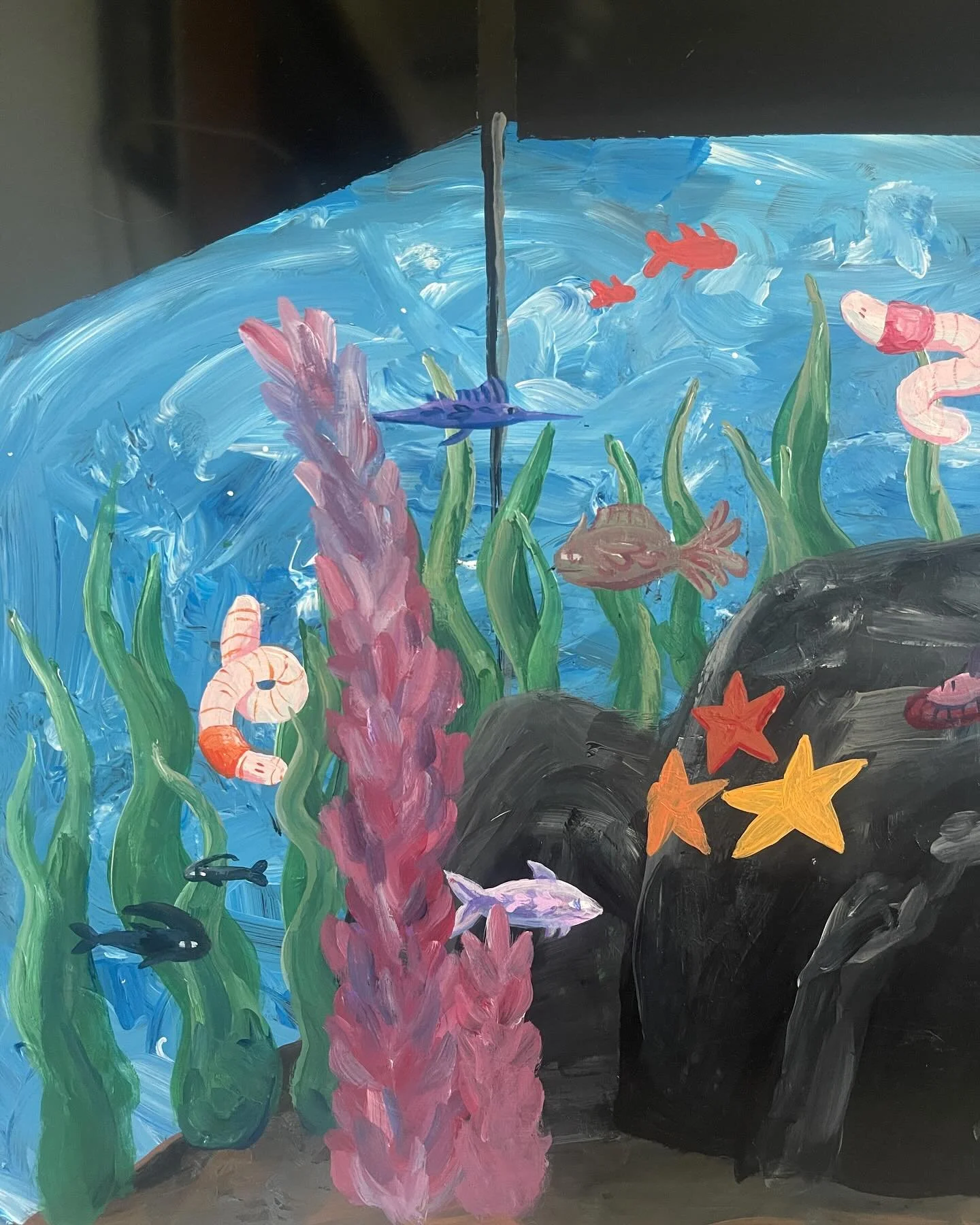 waving my white flag against this cool painting on my old broken tv, various fish inspired by the people in my life