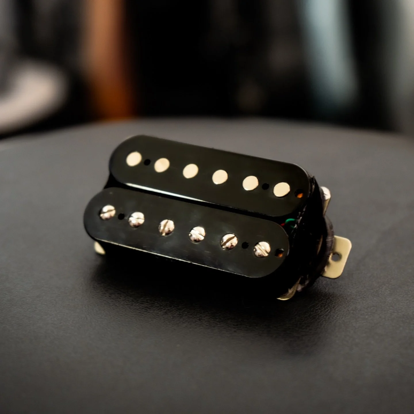 Custom bridge humbucker, based off of the pickup I wound for my Schecter PT! Handwound at Ryan&rsquo;s Guitar Mod Shop, voiced for aggression and clarity.

Off to the USA! 🇺🇸

DCR: 16.2kohms
Inductance: 8H
Magnet type: Unoriented Alnico 5
Wire type