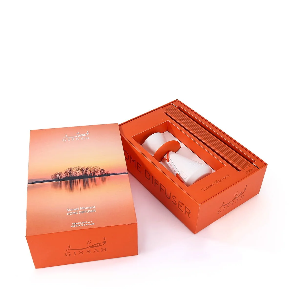 Top view of Gissah Sunset Moment diffuser set inside open box with rattan sticks, premium UK home fragrance