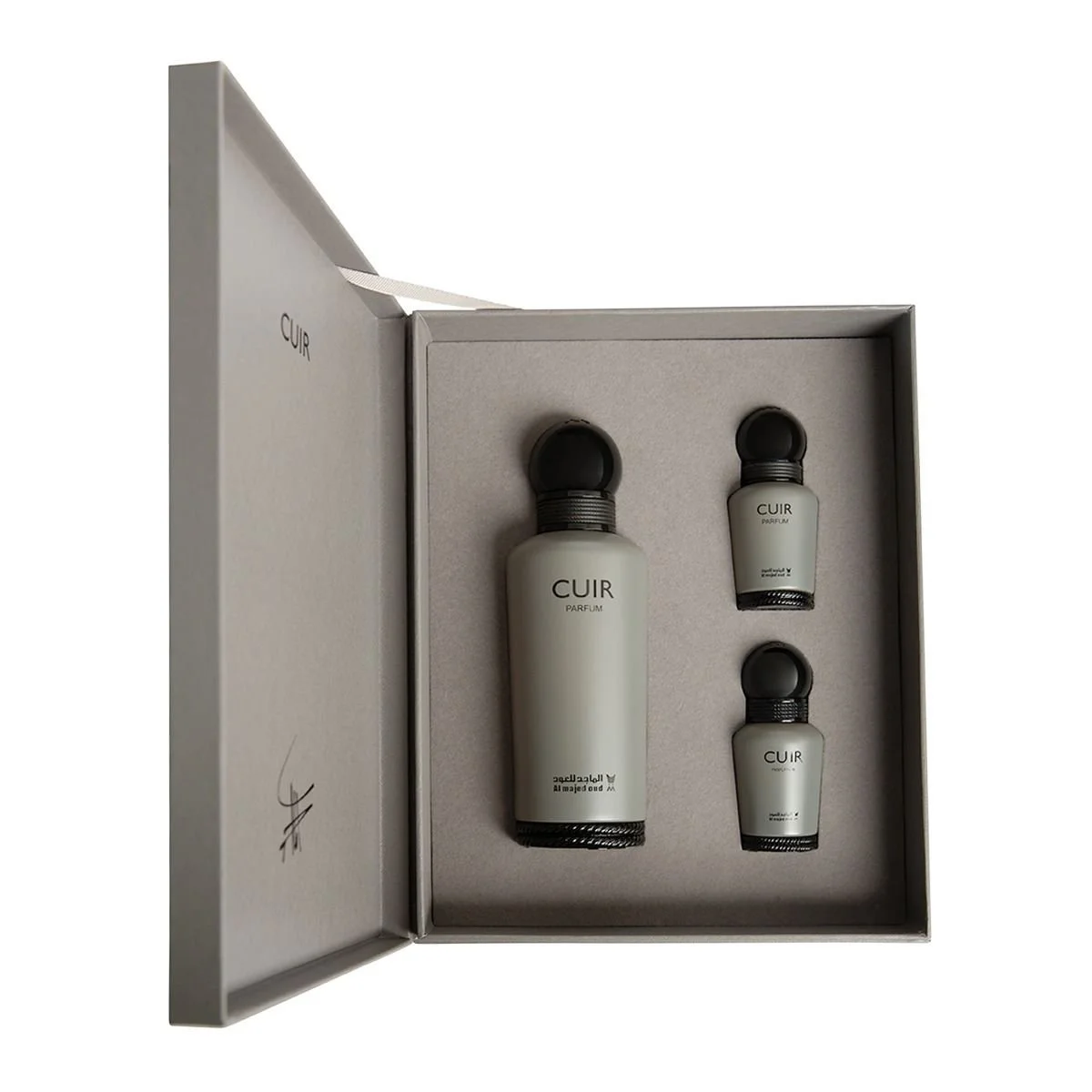 Al Majed Oud Cuir gift set with 150ml perfume, 15ml mini and 15ml oil inside open box, luxury fragrance set UK