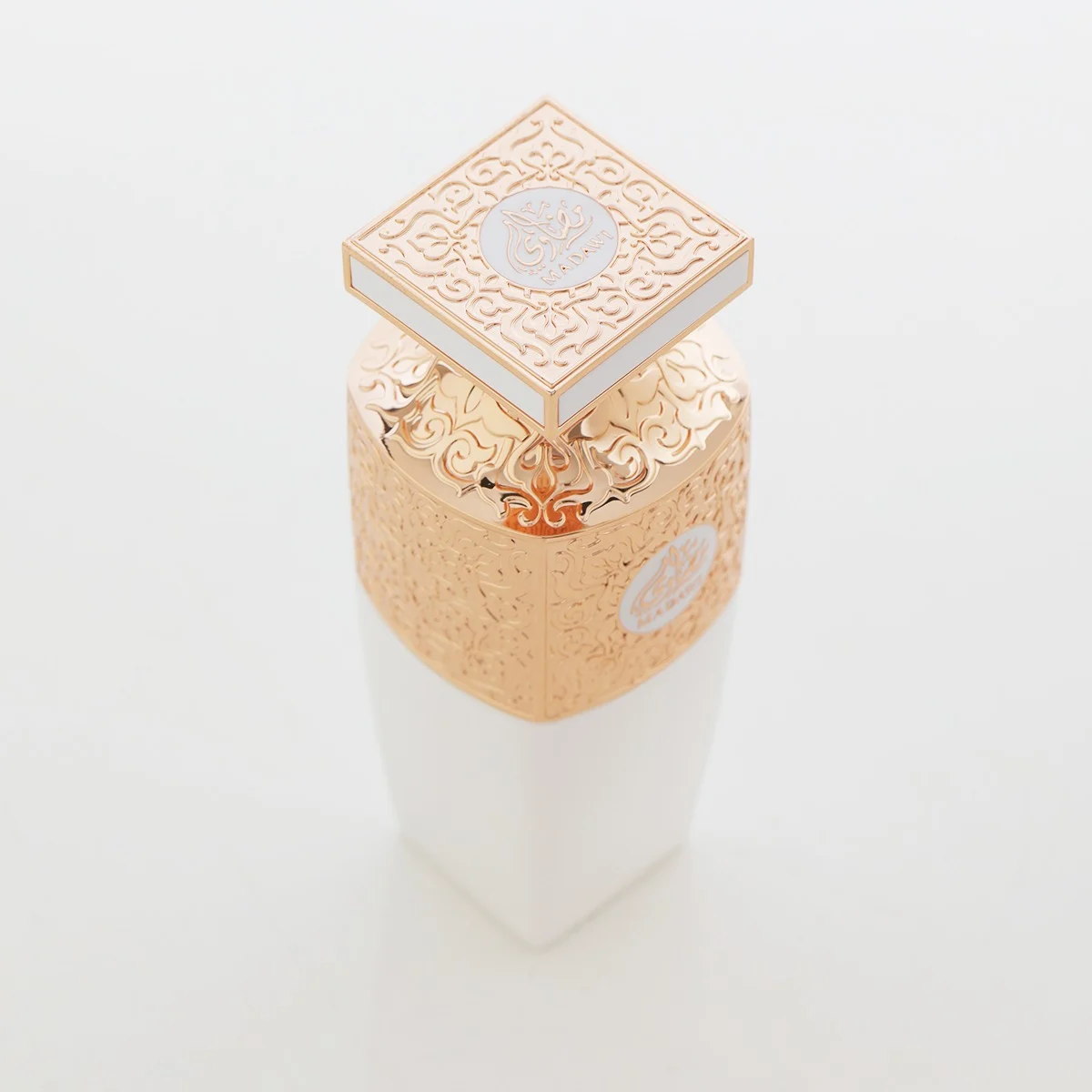 Top view of Arabian Oud Madawi White perfume showcasing luxury gold lid, premium fragrance UK