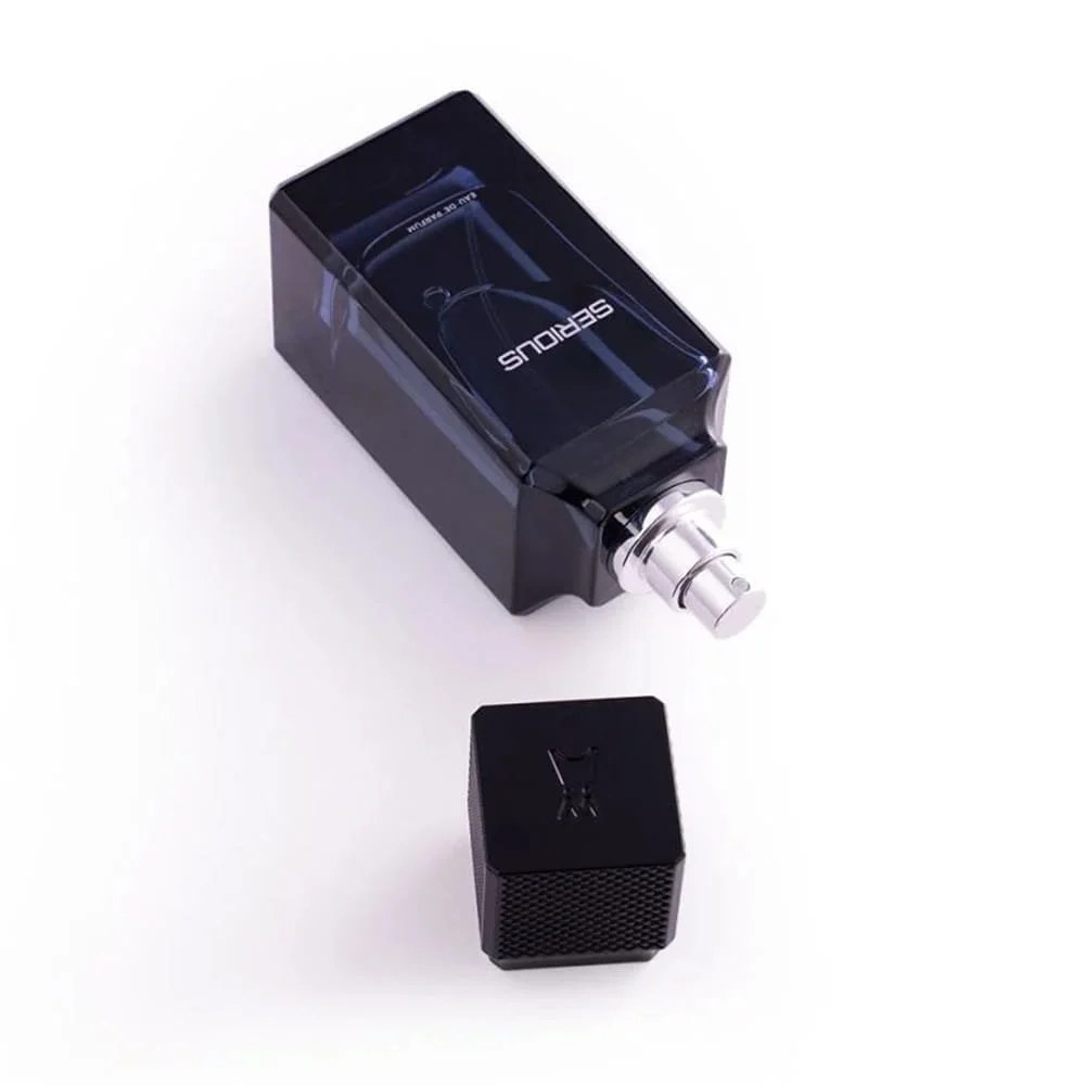 Al Majed Oud Serious eau de parfum 100ml with lid open, premium men’s fragrance UK