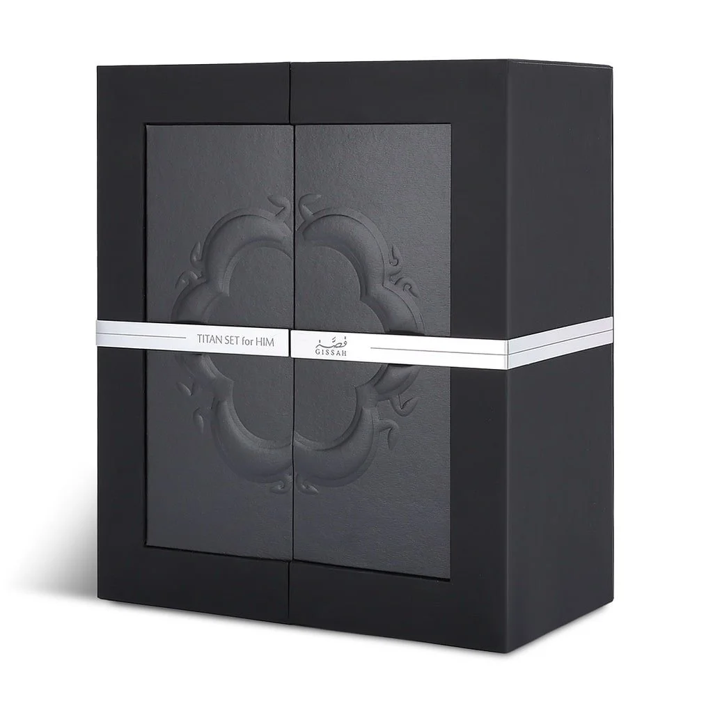 Front view of Titan Him by Gissah black perfume box featuring luxury gold logo and detailing.