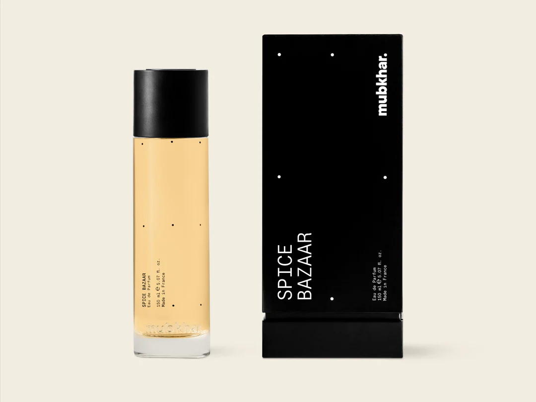 Mubkhar Spice Bazaar Eau De Parfum 150ml next to its box, luxury amber floral fragrance UK