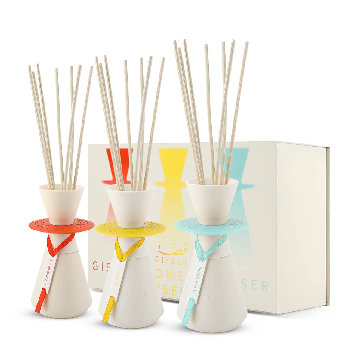 Gissah Home Diffusers displayed in front of the elegant box from an angle – Sunset Moment, Charming Day, Bubble Breeze – Al Rashid Galleria UK