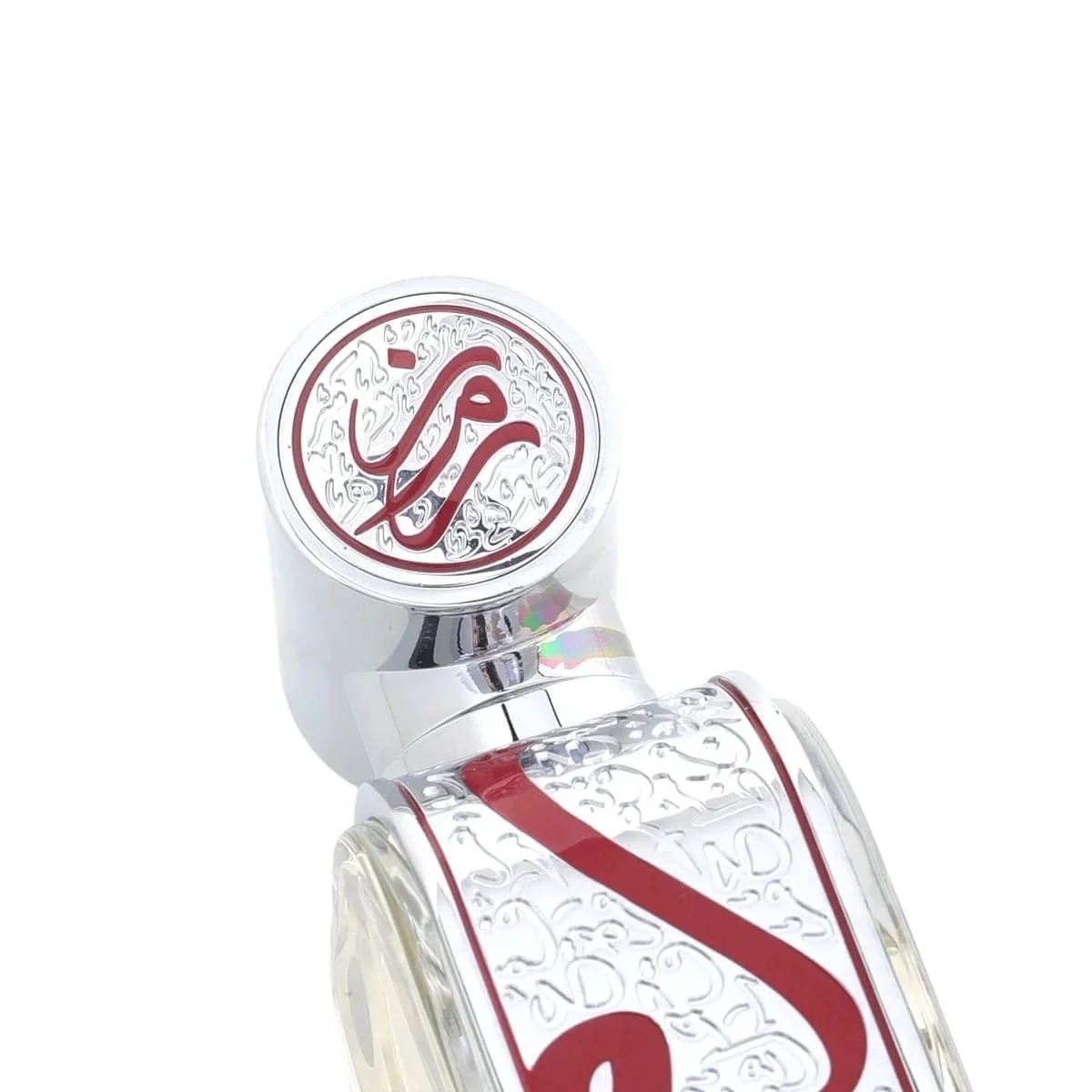 Close-up of the decorative luxury top of the Arabian Oud Ramz Red 100ml perfume bottle