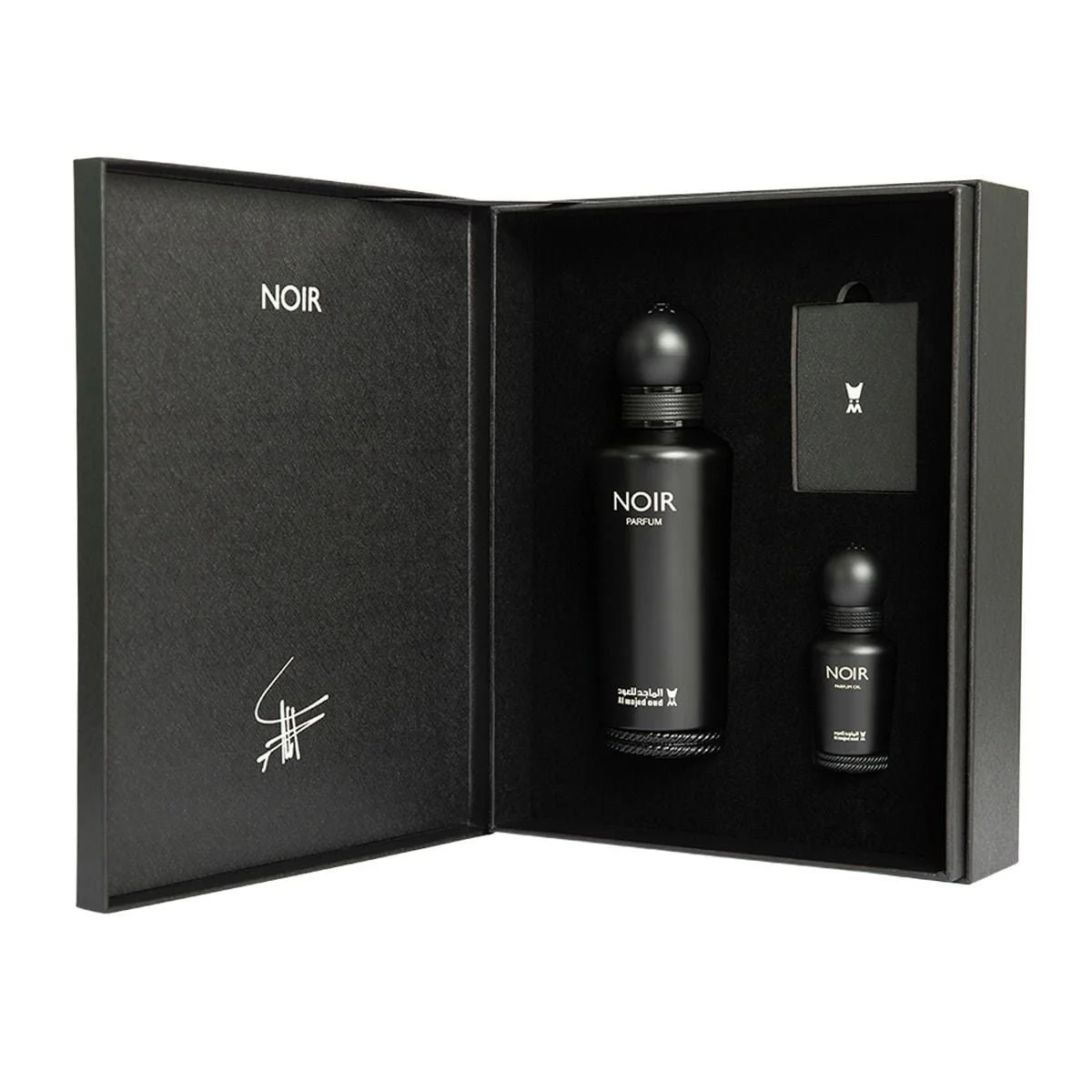Al Majed Oud Noir gift set with 150ml perfume and 15ml oil inside open box, luxury fragrance set UK