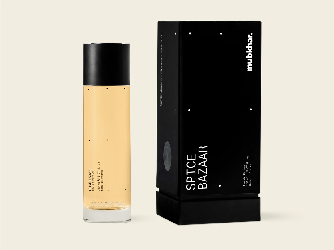 Mubkhar Spice Bazaar Eau De Parfum 150ml beside its box, elegant amber woody perfume UK