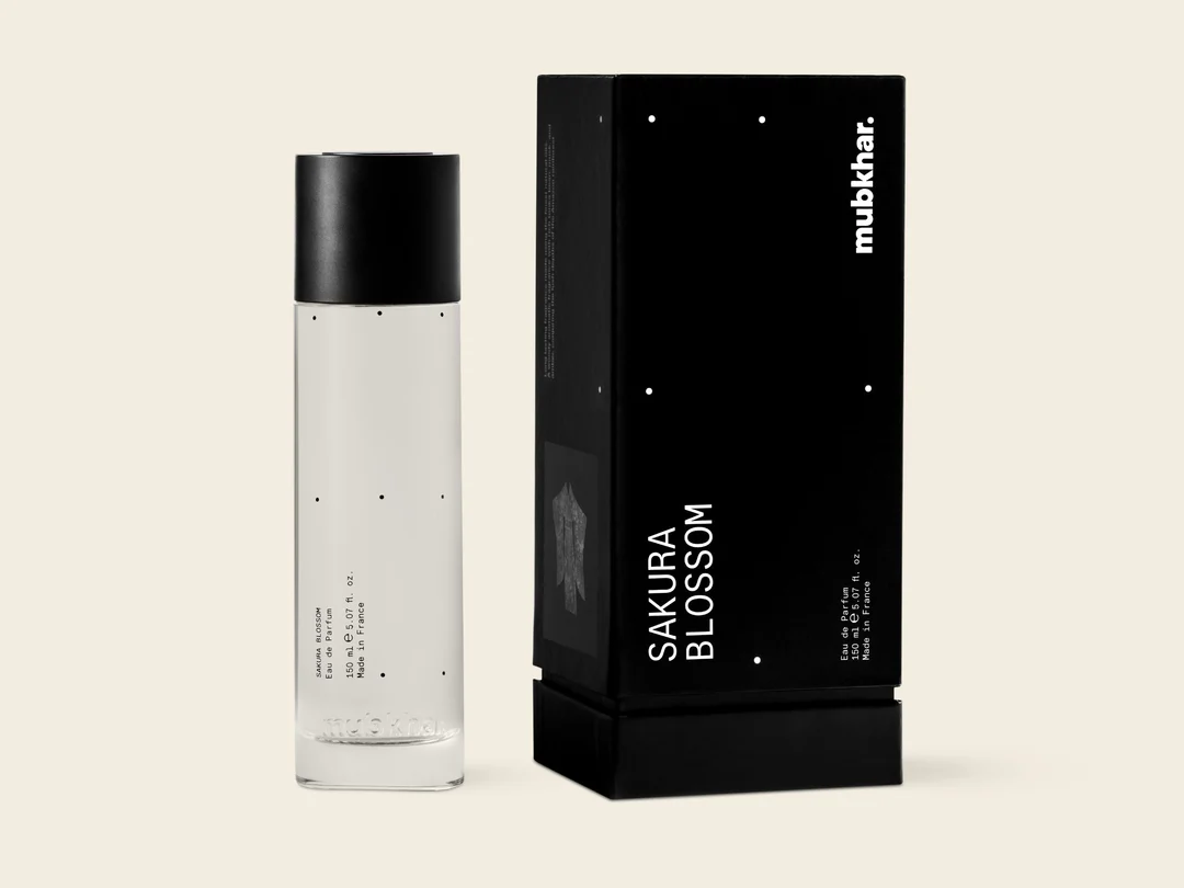 Mubkhar Sakura Blossom Eau De Parfum 150ml beside its box, elegant unisex fragrance UK