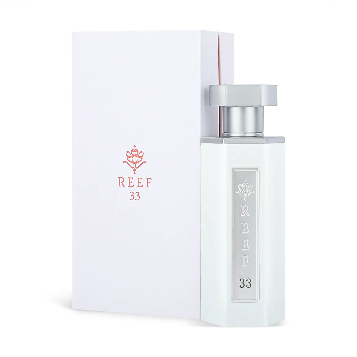 Reef 33 White perfume bottle placed next to its elegant packaging box on white background