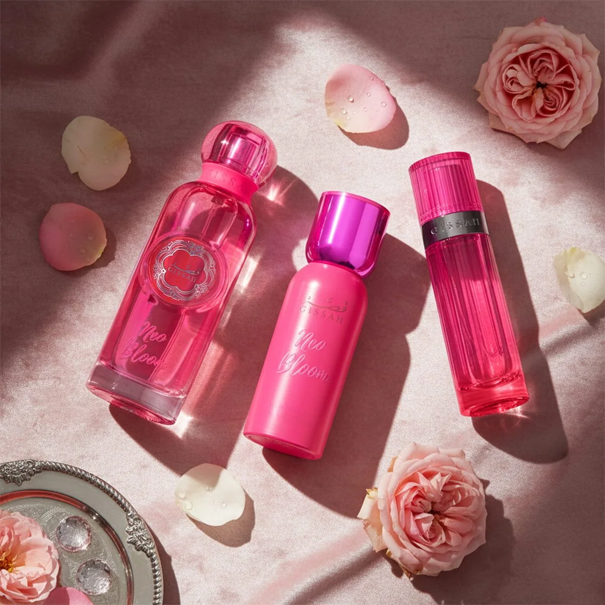 Gissah Neo Bloom Valentine’s perfume set on soft pink background with roses