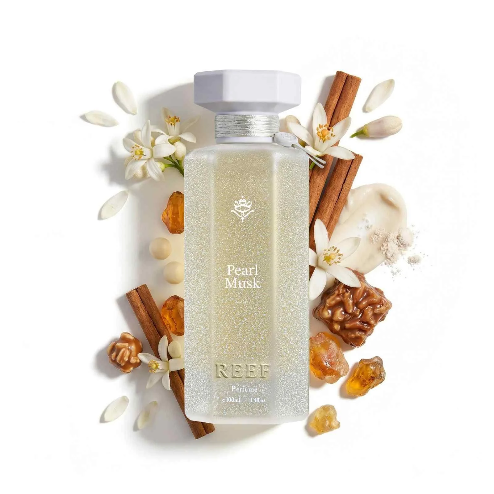 Reef Pearl Musk perfume with orange blossom, cinnamon, amber and musk notes, luxury Arabian fragrance UK