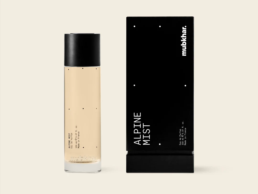 Mubkhar Alpine Mist Eau De Parfum 150ml next to its box, luxury woody fougere fragrance UK
