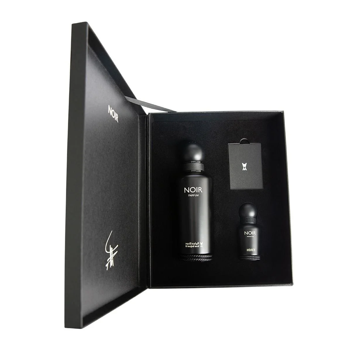 Al Majed Oud Noir gift set open box angled view showing perfume and oil, premium fragrance set UK
