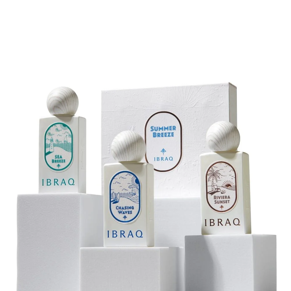 Hero shot of IBRAQ Summer Breeze Set perfumes in front of luxury box, premium summer fragrance set UK