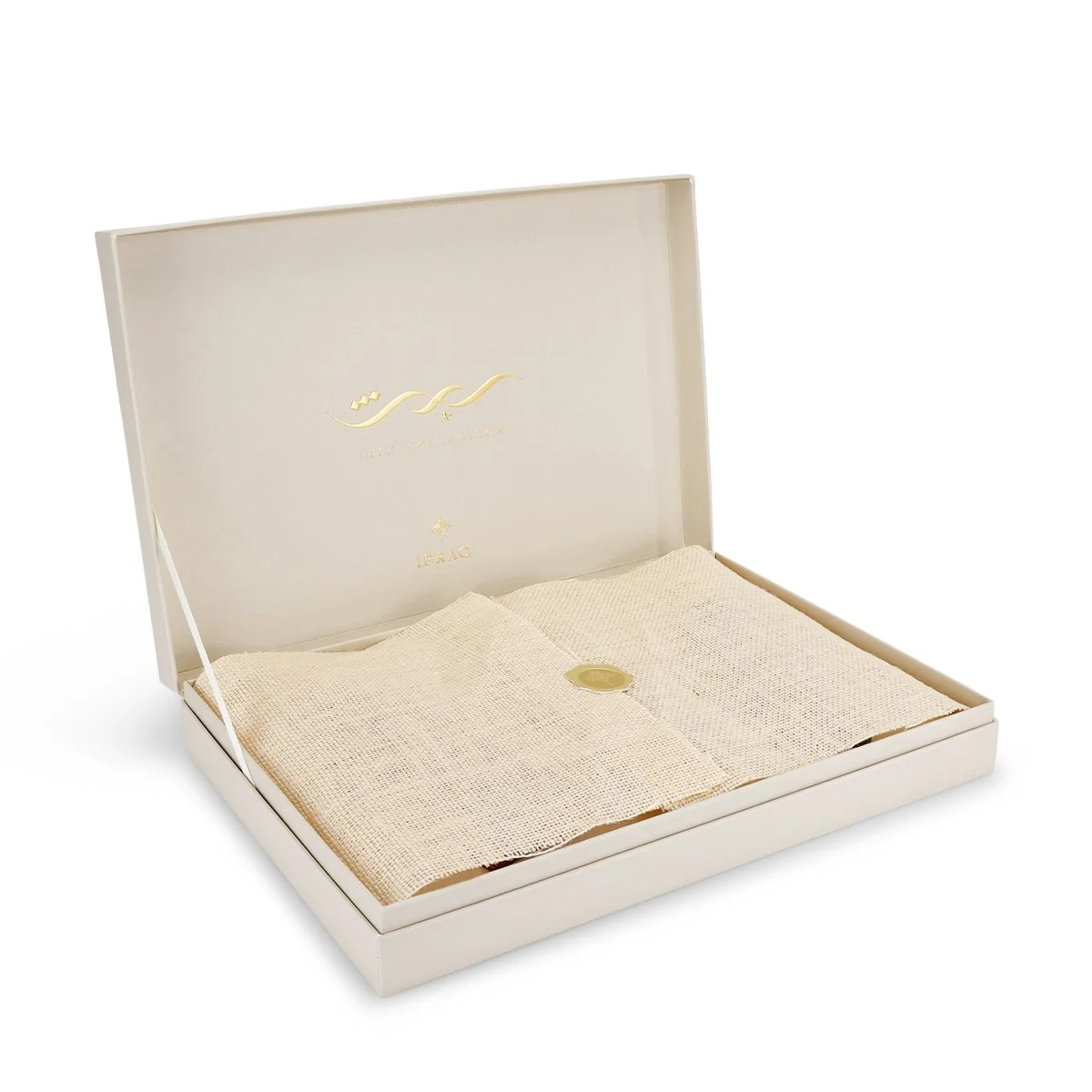 Opened Irth Collection perfume box revealing its elegant craftsmanship and refined luxury design.