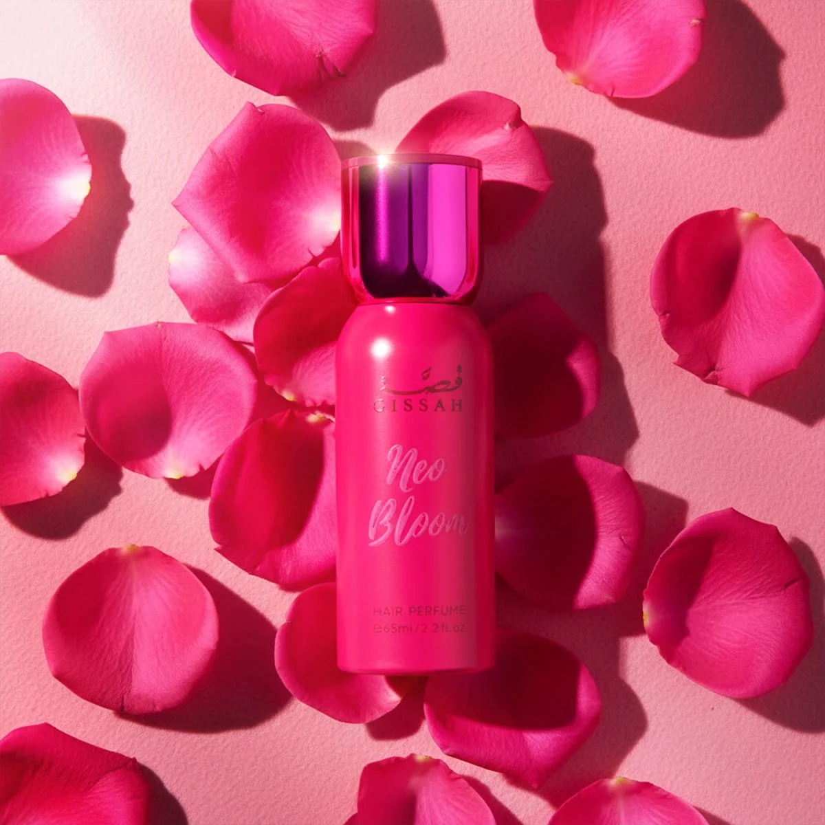 Gissah Neo Bloom perfumed hair spray with rose petals background