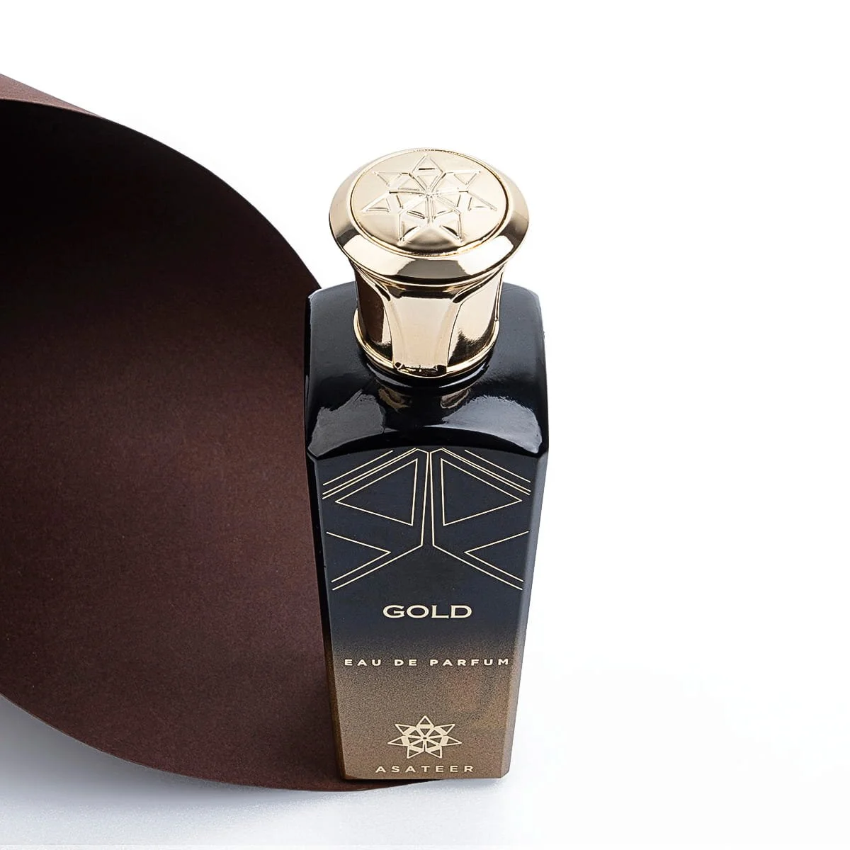 Close-up of Asateer Gold Eau De Parfum luxury gold cap and bottle details UK