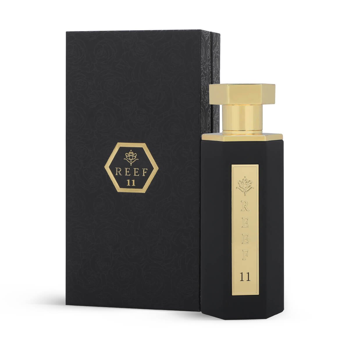 Reef 11 perfume bottle placed beside its elegant packaging box on white background