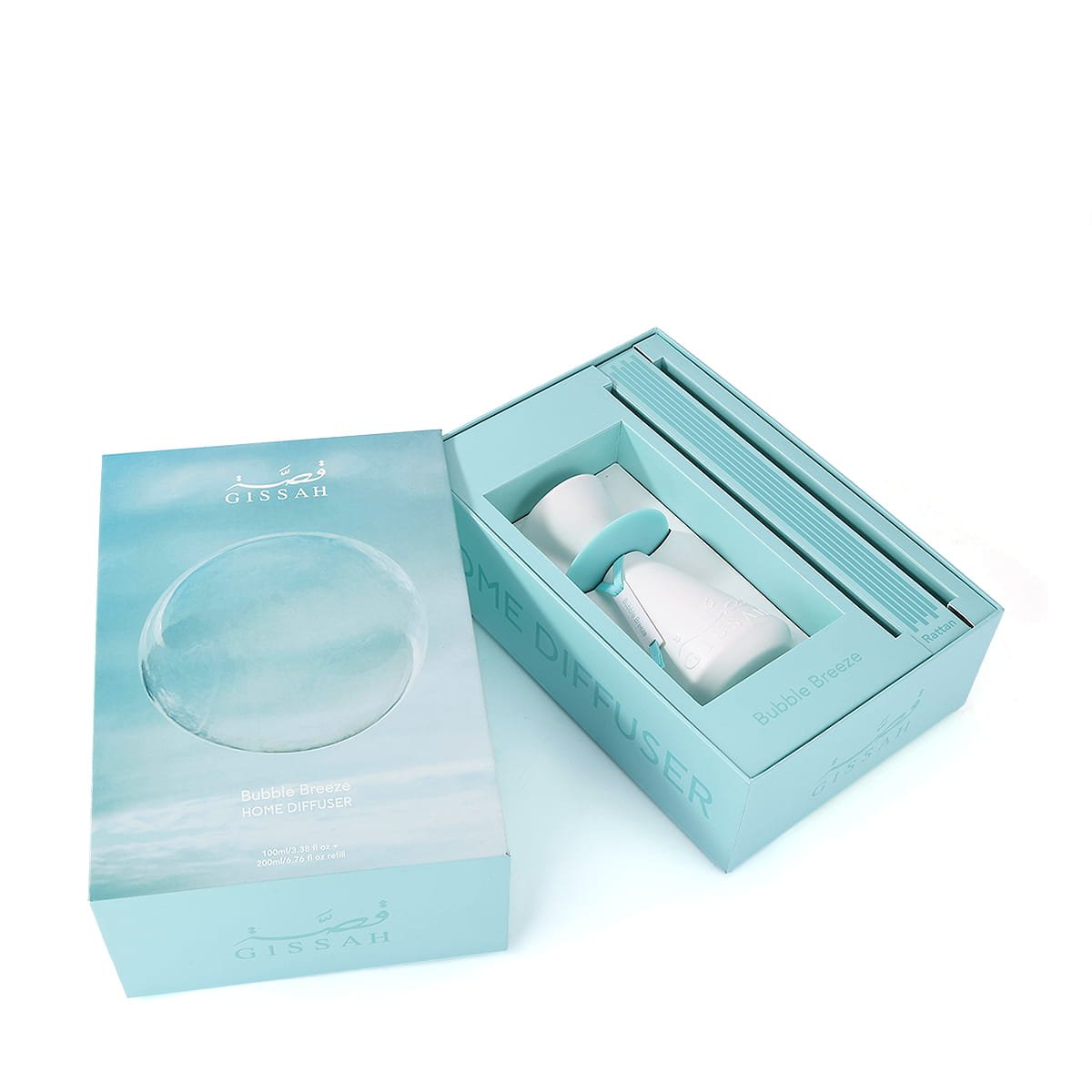Top view of Gissah Bubble Breeze diffuser set inside open box with rattan sticks, premium UK home fragrance
