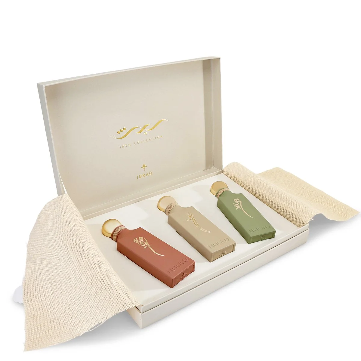 Irth Collection gift set interior featuring Nawa, Jareed, and Athq perfumes displayed inside a luxurious presentation box.