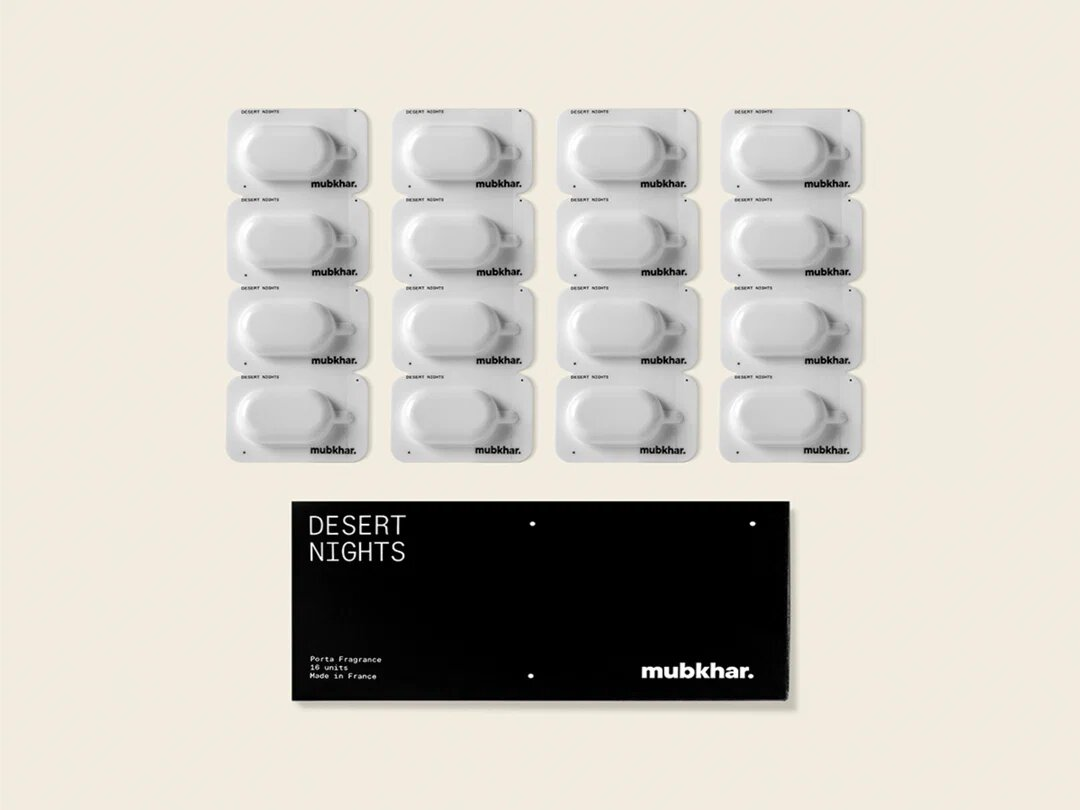 Mubkhar Porta Fragrance Desert Nights capsules next to box, luxury portable fragrance UK