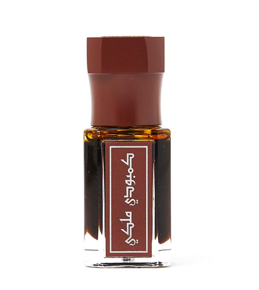 Arabian Oud Royal Cambodian Dehn Oud oil 1/2 tola on white background, pure oud oil UK