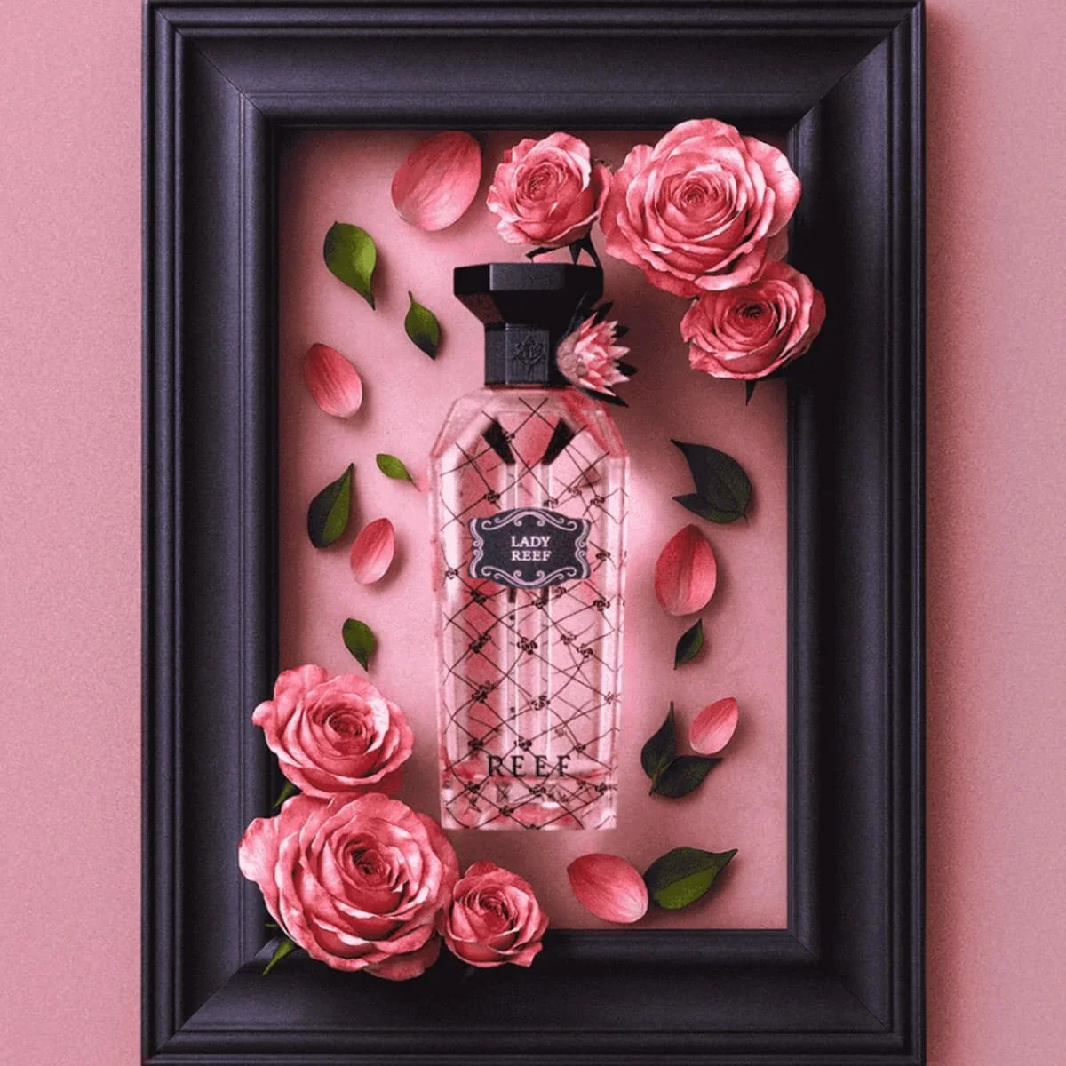 Lady Reef perfume by Reef Perfumes displayed in a pink rose frame background, feminine luxury fragrance from Al Rashid Galleria UK