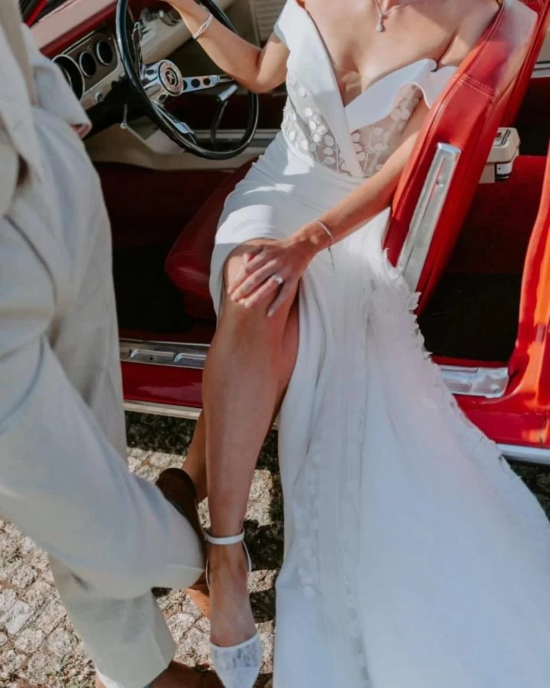 A moment for this dress 😍 This was a beautiful dress to work on, so unusual! Combining a mixture of fabrics and styles in one. This dress was classic but modern at the same time. Looks amazing on our bride here in a classic car on the day! 

 #RealB