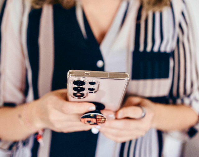 JoySpace therapy holding phone