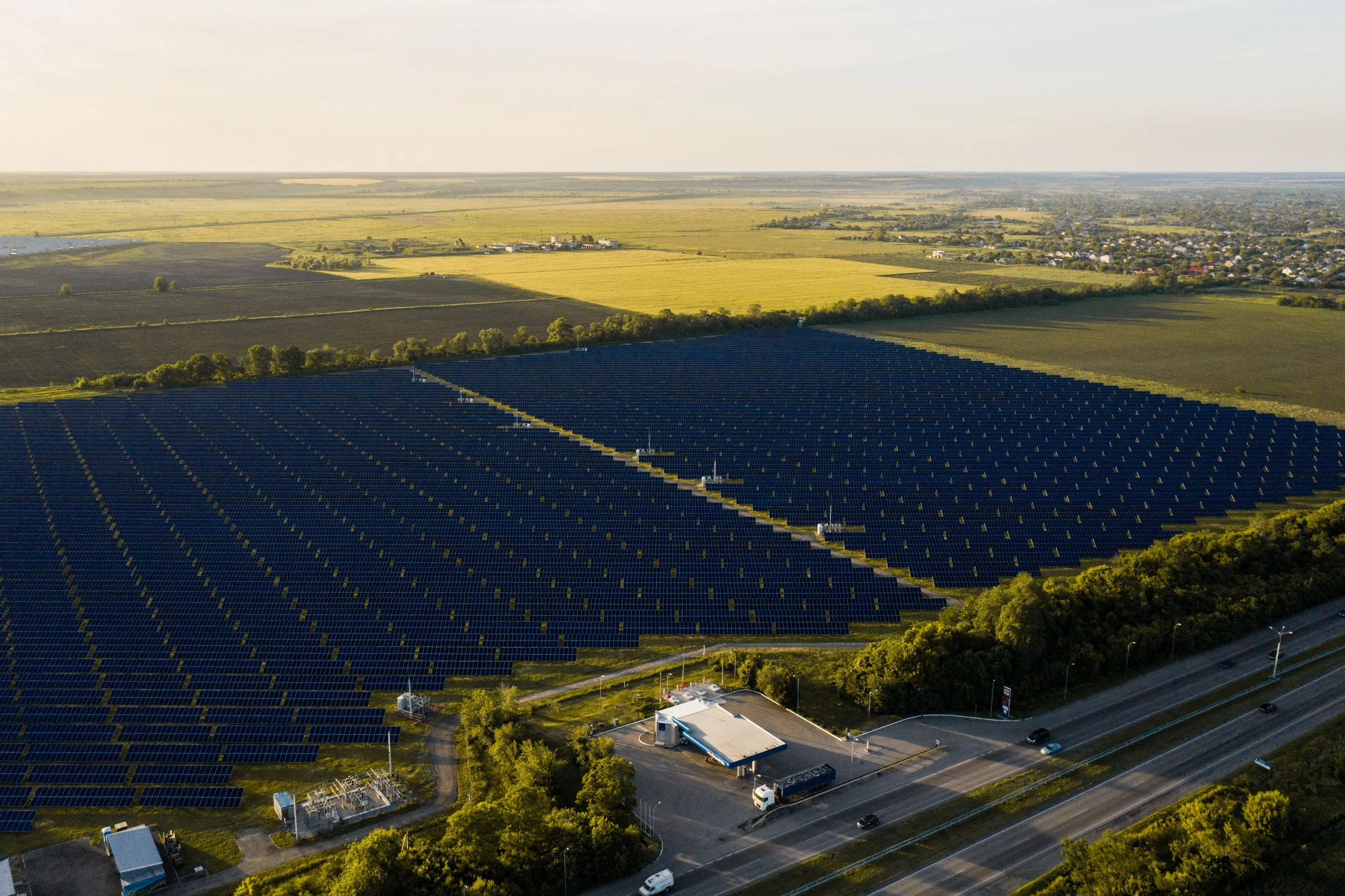 aerial-top-view-of-a-solar-panels-power-plant-2024-10-18-07-48-51-utc.jpg (Copy) (Copy) (Copy) (Copy)