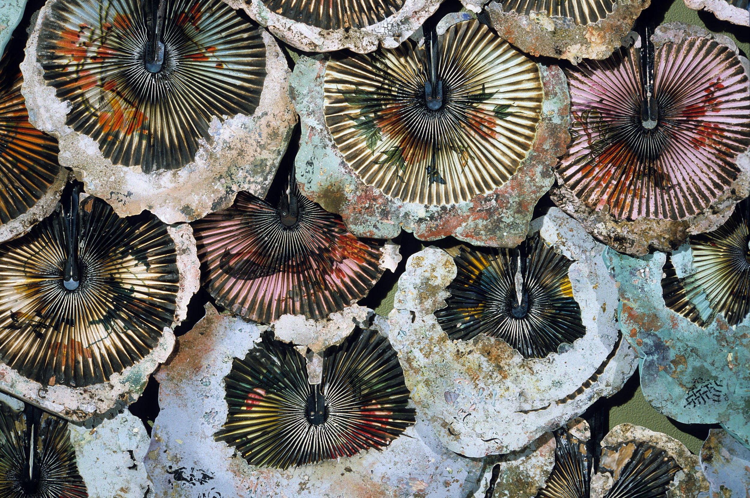 Installation view (detail), Cast Hydrostone, silk, fans, pigment (119 embedded fans), 16 feet by 8 feet, The Art Complex Museum, Duxbury, MA, 1997