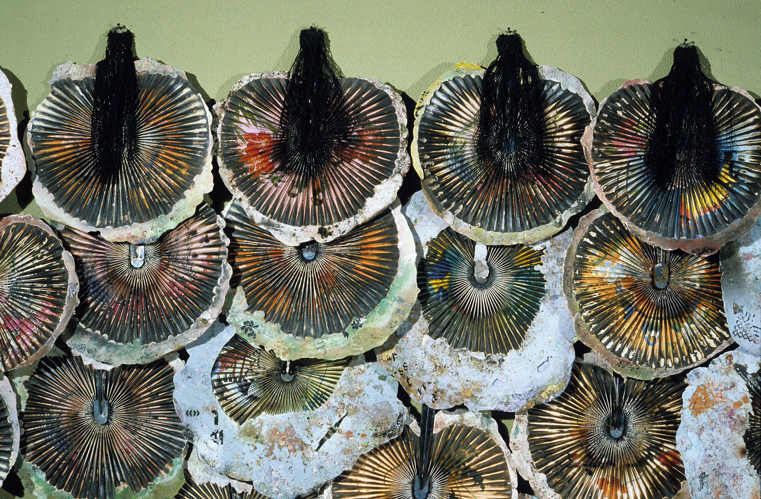 Installation view (detail), Cast Hydrostone, silk, fans, pigment (119 embedded fans), 16 feet by 8 feet, The Art Complex Museum, Duxbury, MA, 1997