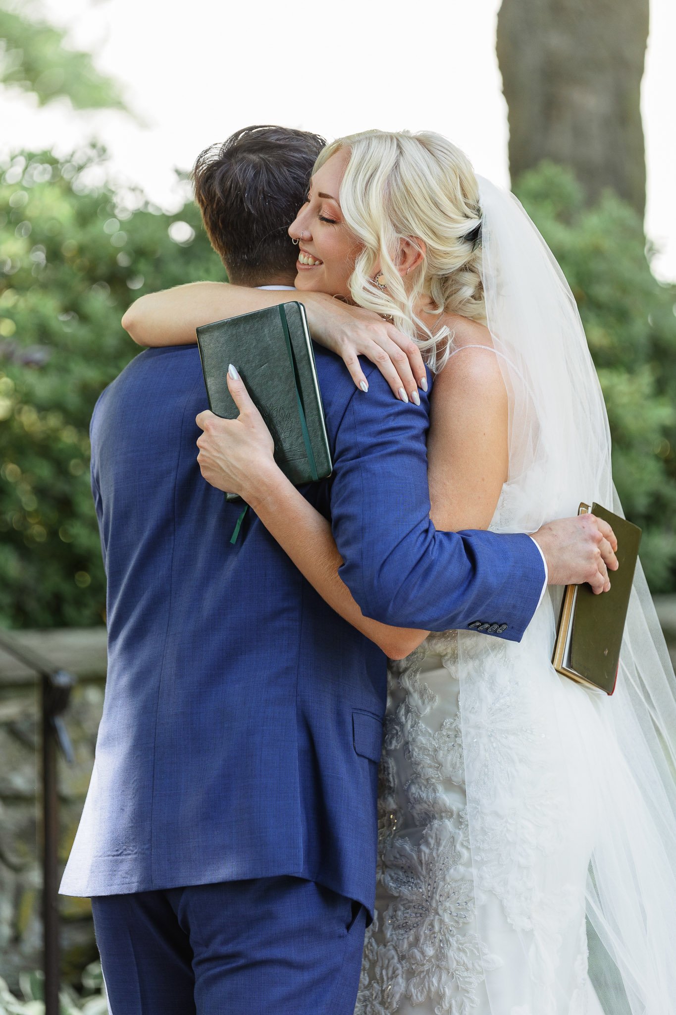 the bride and groom embrace after a private vow ceremony at Drumore Estate