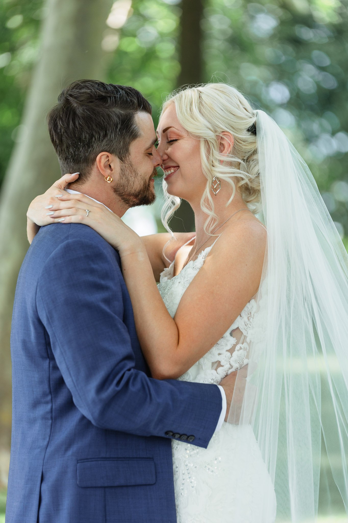 Formal wedding photo of the bride and groom looking directly at each other during their Drumore Estate Wedding