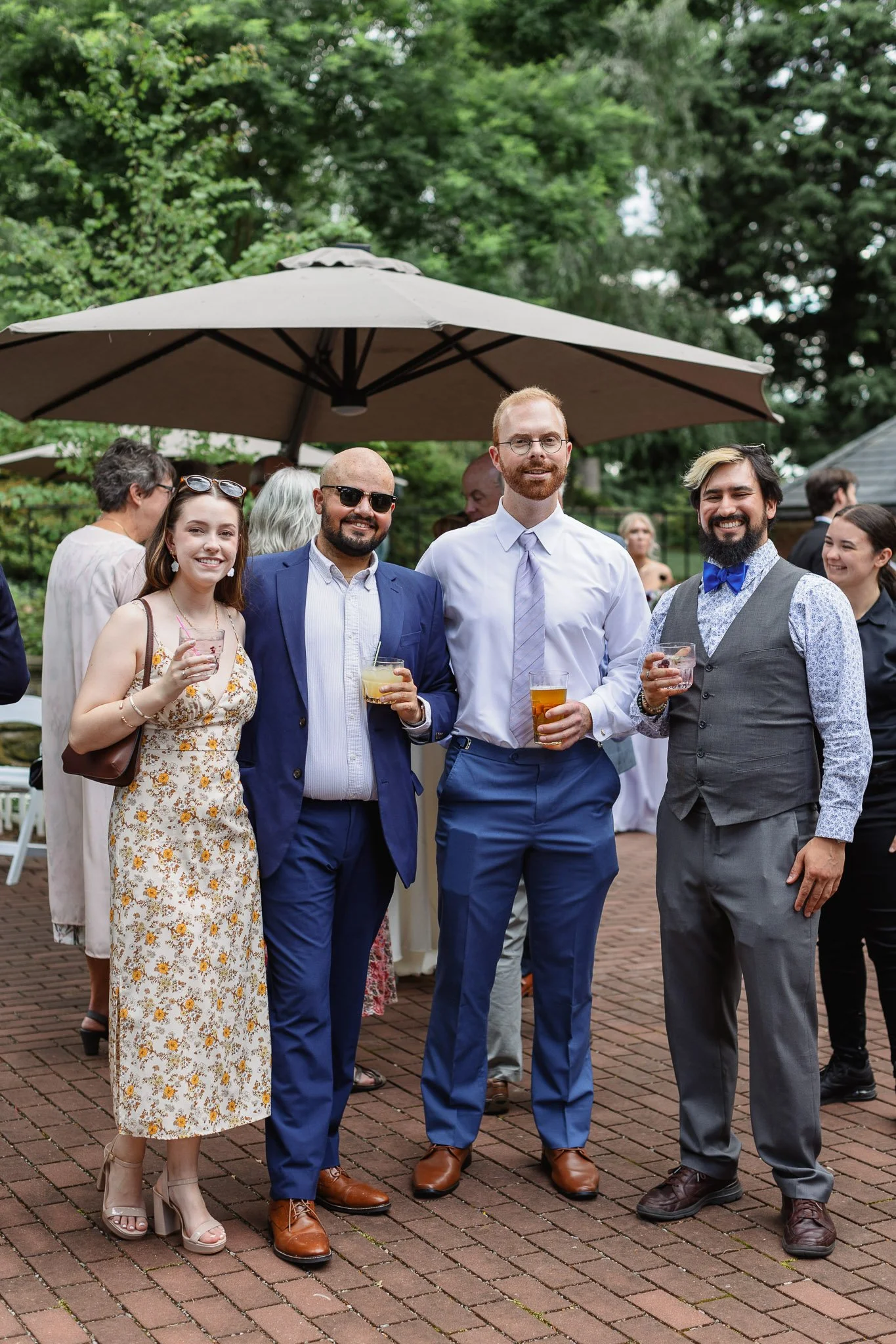 Wedding guests mingle against the scenic backdrop of the Pequea, Pennsylvania countryside.