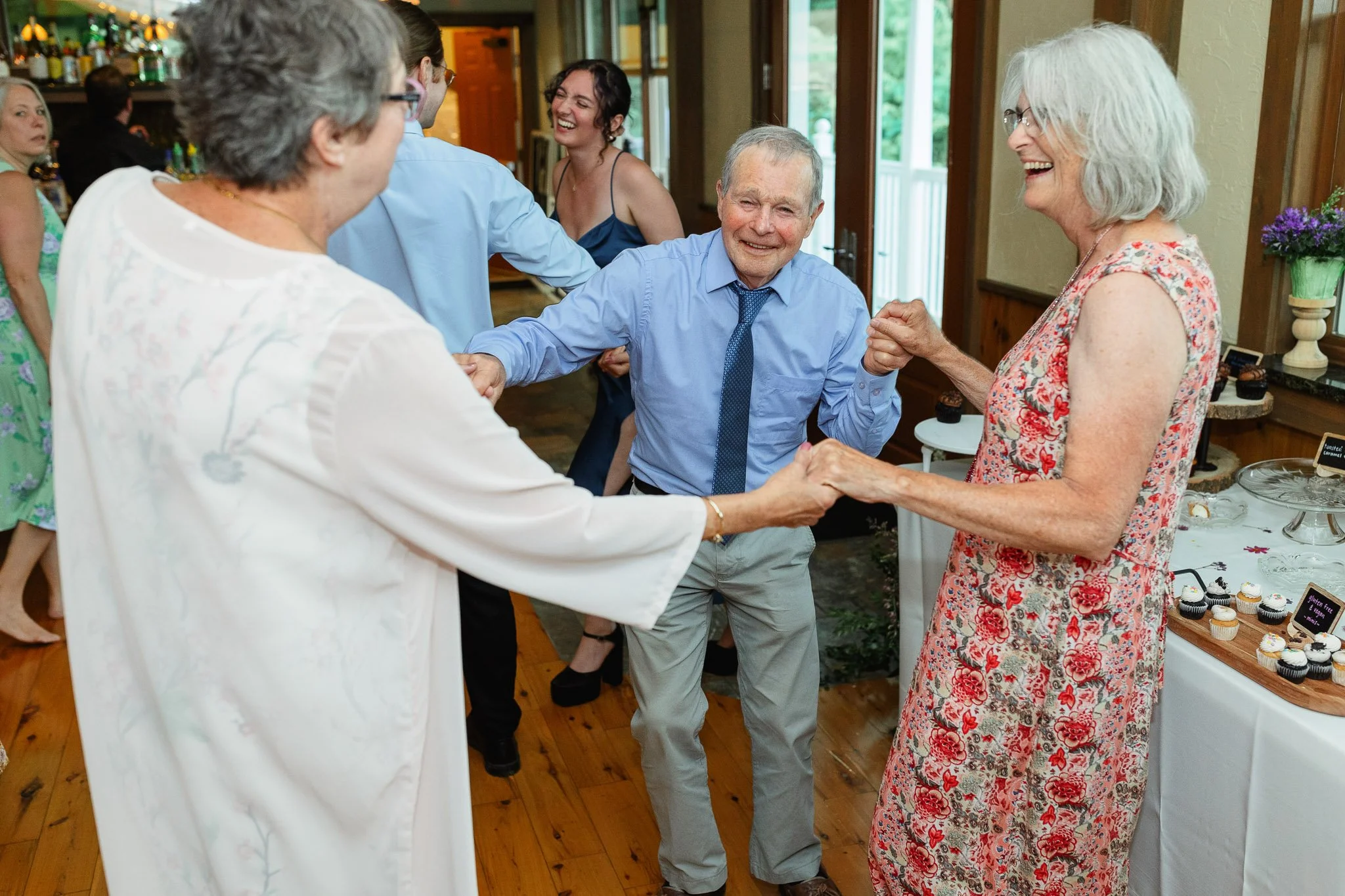 A wedding photographer captures the movement and joy of a crowded dance floor at the Pequea, Pennsylvania venue.