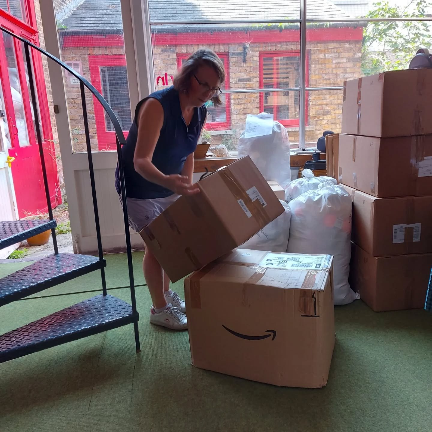 It's very warm at KFP HQ this week, but we're still working hard packing boxes with blankets and clothes for when the weather cools down again.  The volunteers were getting a consignment ready for collection by the courier yesterday.  It's toasty wor